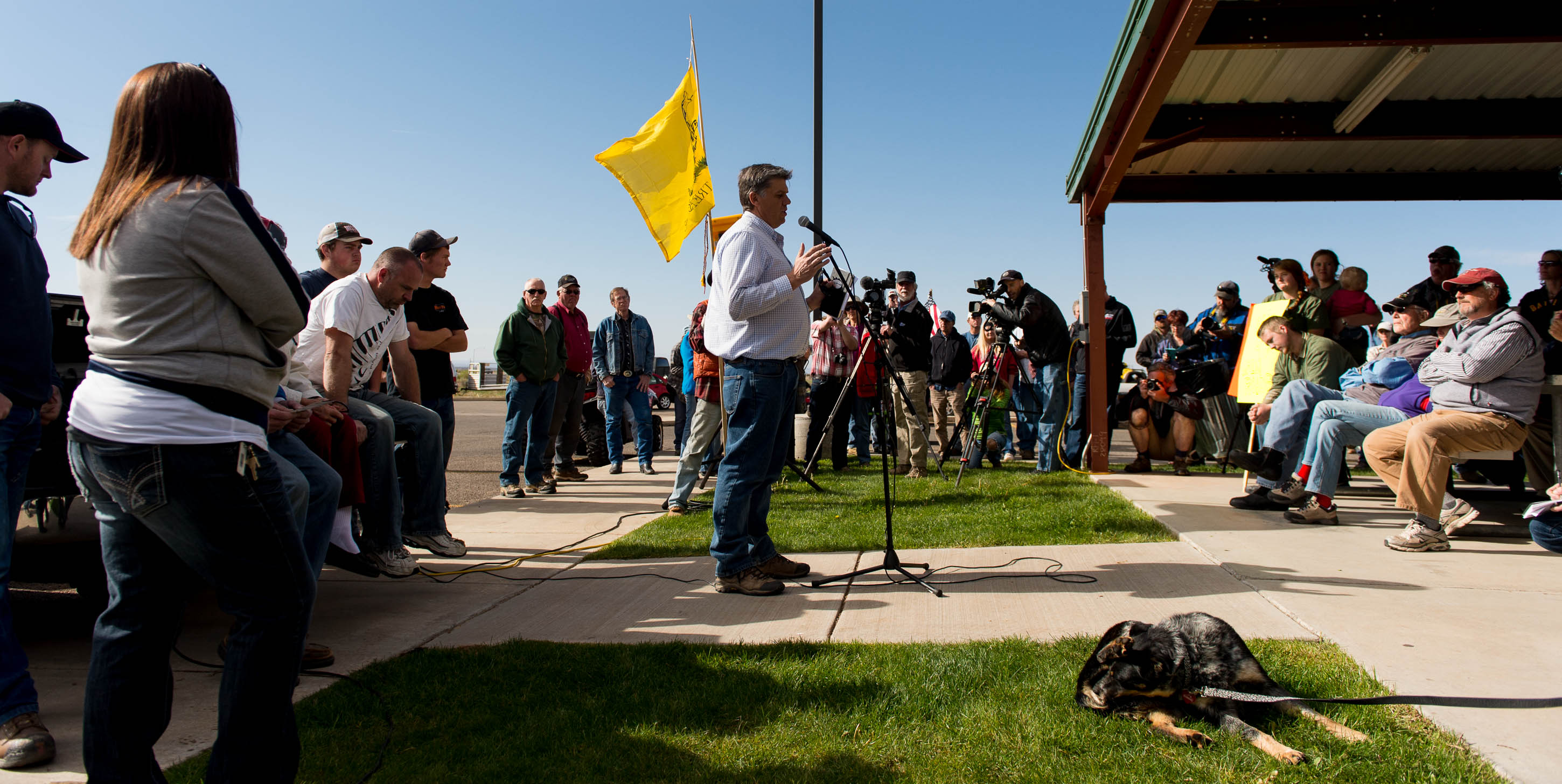 Trent Nelson | The Salt Lake Tribune
A group of people listened to San Juan County Commissioner Phil Lyman in Blanding's Centennial Park Saturday May 10, 2014, prior to an ATV ride into Recapture Canyon, closed to motorized use since 2007 to protect the seven-mile long canyon's archeological sites.