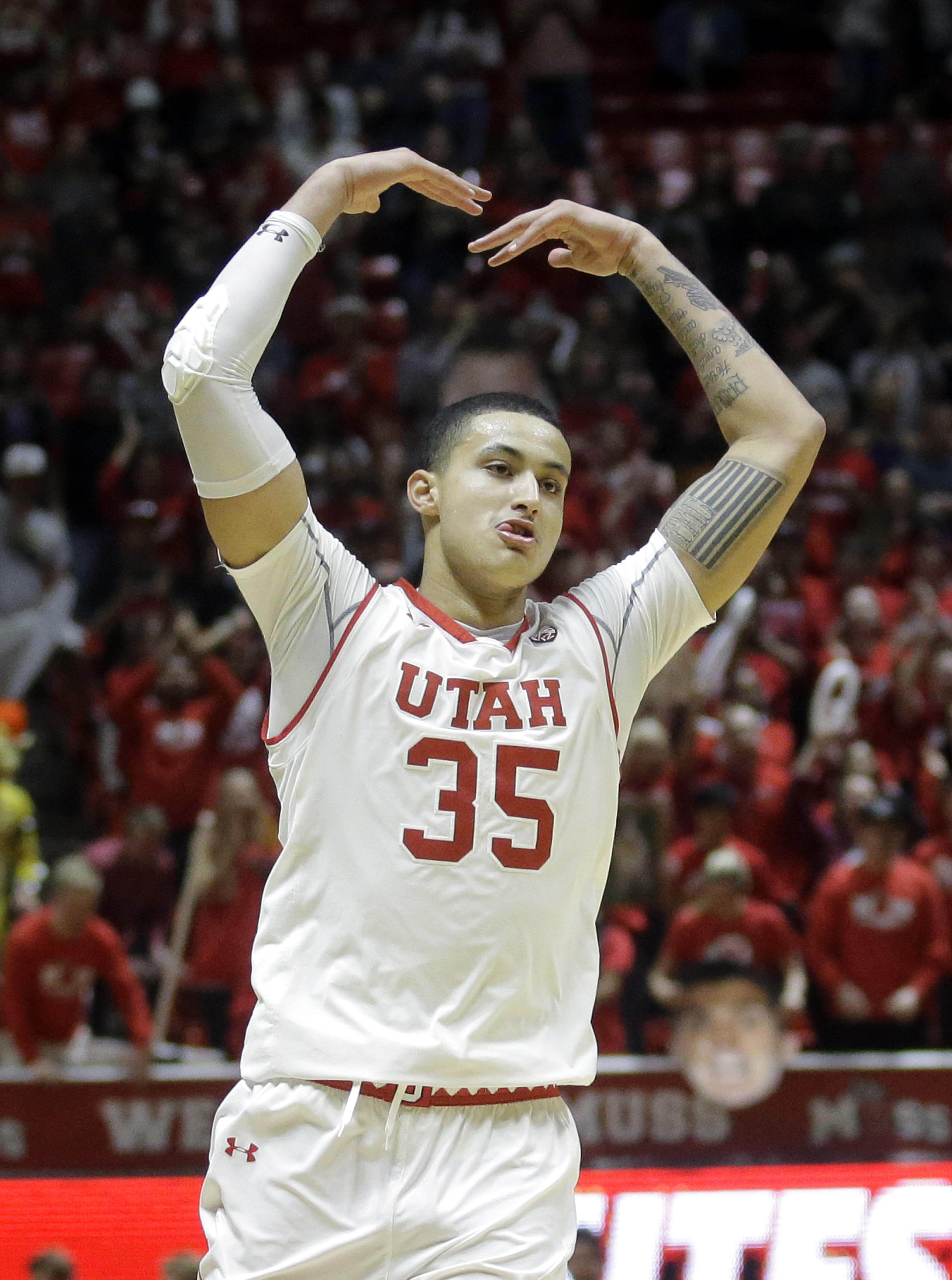Utah forward Kyle Kuzma (35) celebrates during the second half in an NCAA college basketball game against Stanford Saturday, March 4, 2017, in Salt Lake City. Utah won 67-59. (AP Photo/Rick Bowmer)