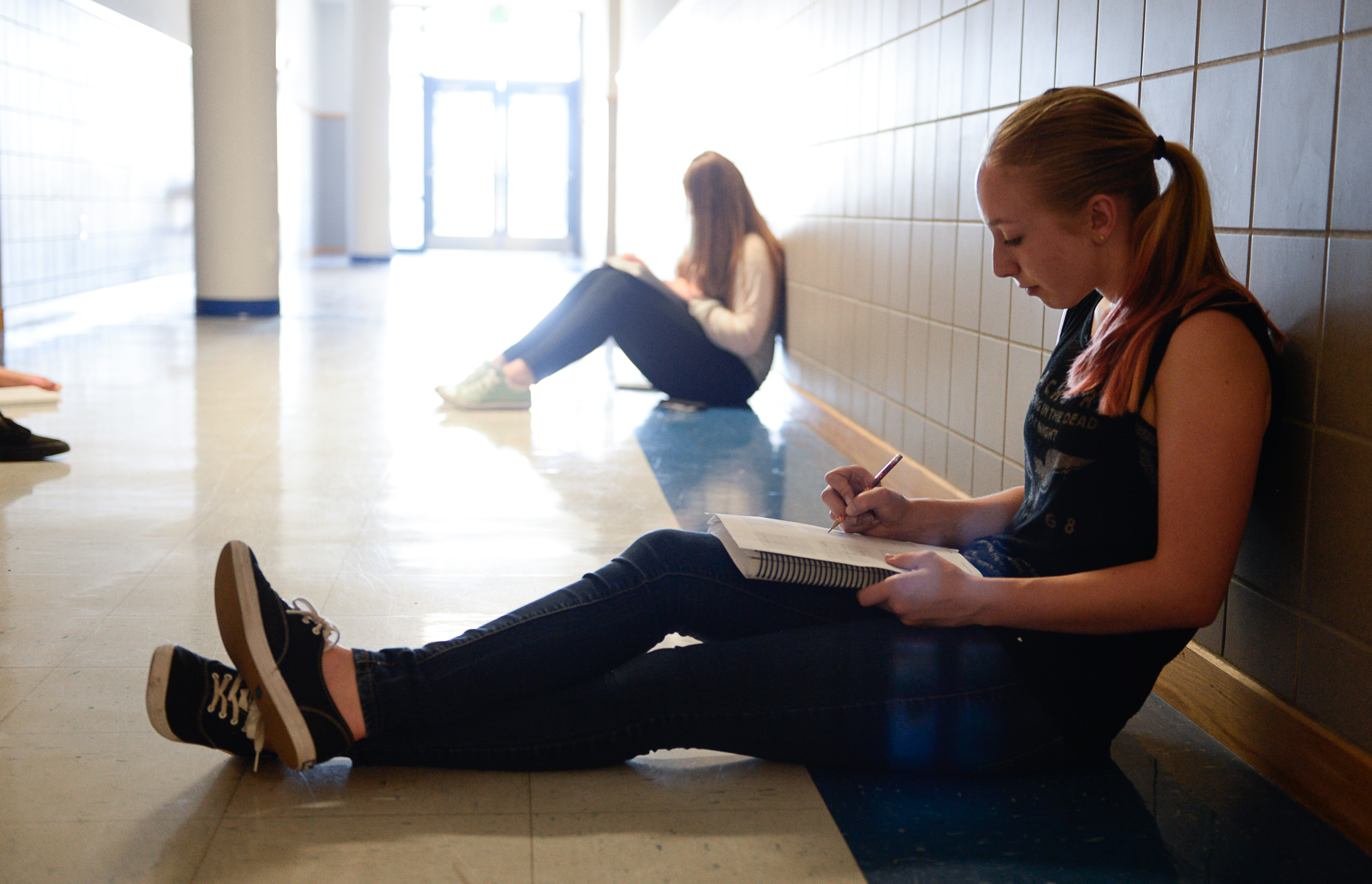 Francisco Kjolseth | The Salt Lake Tribune
Diane Baur (cq), 15, seeks the refuge of a slightly cooler hallway at Bingham High school as students accelerate their high school credits during the summer months to get a head-start on graduation requirements. On Tuesday, June 30, a group managed to carry on despite the AC going out a few days prior as they waited for the system to be fixed.