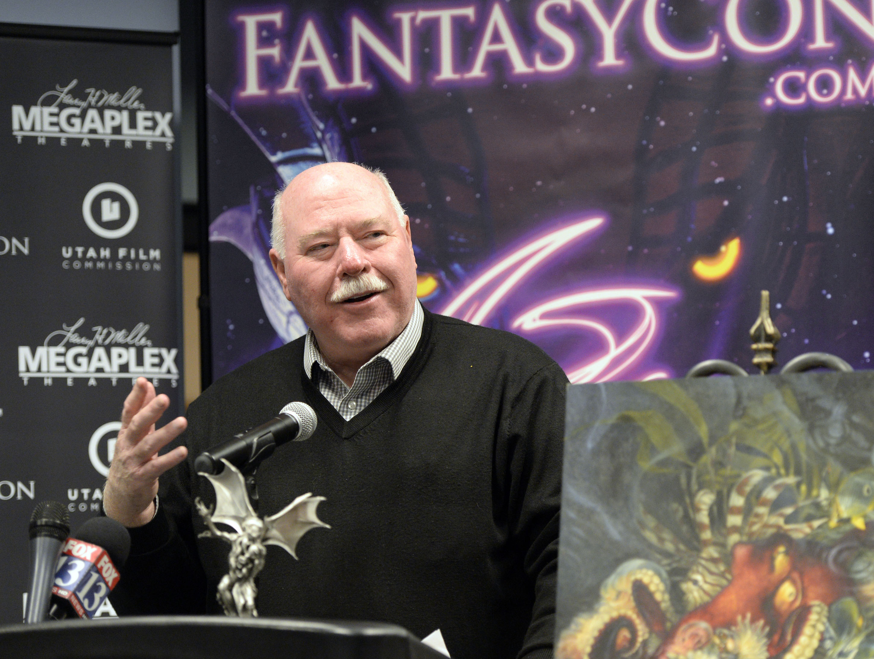 Al Hartmann | The Salt Lake Tribune
Sandy Mayor Tom Dolan welcomes FantasyCon at press conference in Sandy City Hall Wednesday Dec. 17 to announce new convention dates and a new partnership with Sandy City and Jordan Commons . FantasyCon also announced new convention dates and the dates for FilmQuest Festival. FantasyCon is a 3 day convention that brings to life the fantasy books, movies and artwork that fans love in a fully immersive environment for the entire family. The convention will be June 2-4, 2016 in Sandy's South Towne Center.