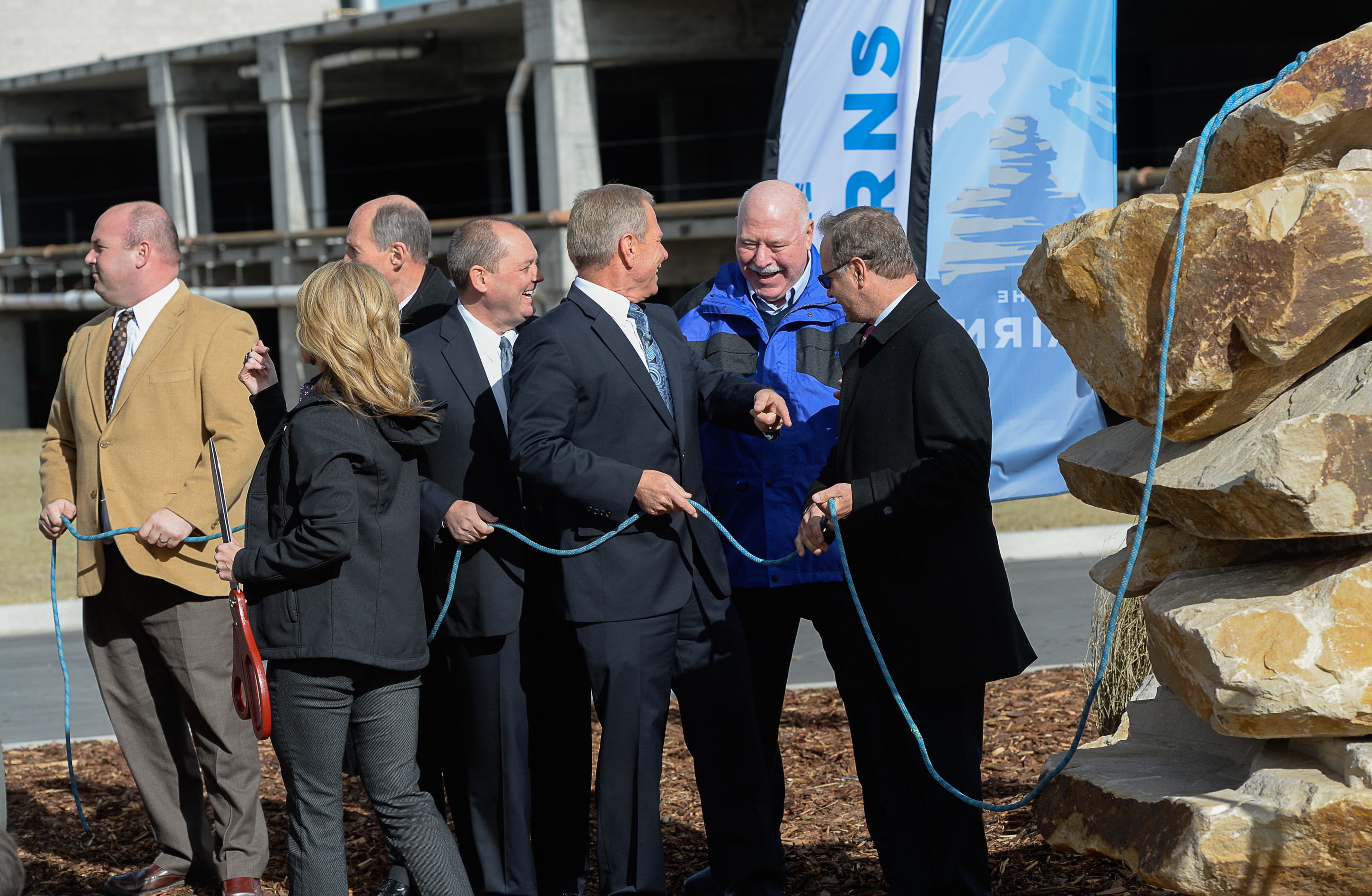 Francisco Kjolseth | The Salt Lake Tribune
Sandy officials, including Mayor Tom Dolan, second from right, hold a "climbing rope" cutting event at the site of the future Prestige, a 25-story high-rise residential building in the heart of a new 1,100 acre city center called "The Cairns." The project from 90th S. to 114th S., and I-15 to UTA light rail calls for 20 million square feet of development.