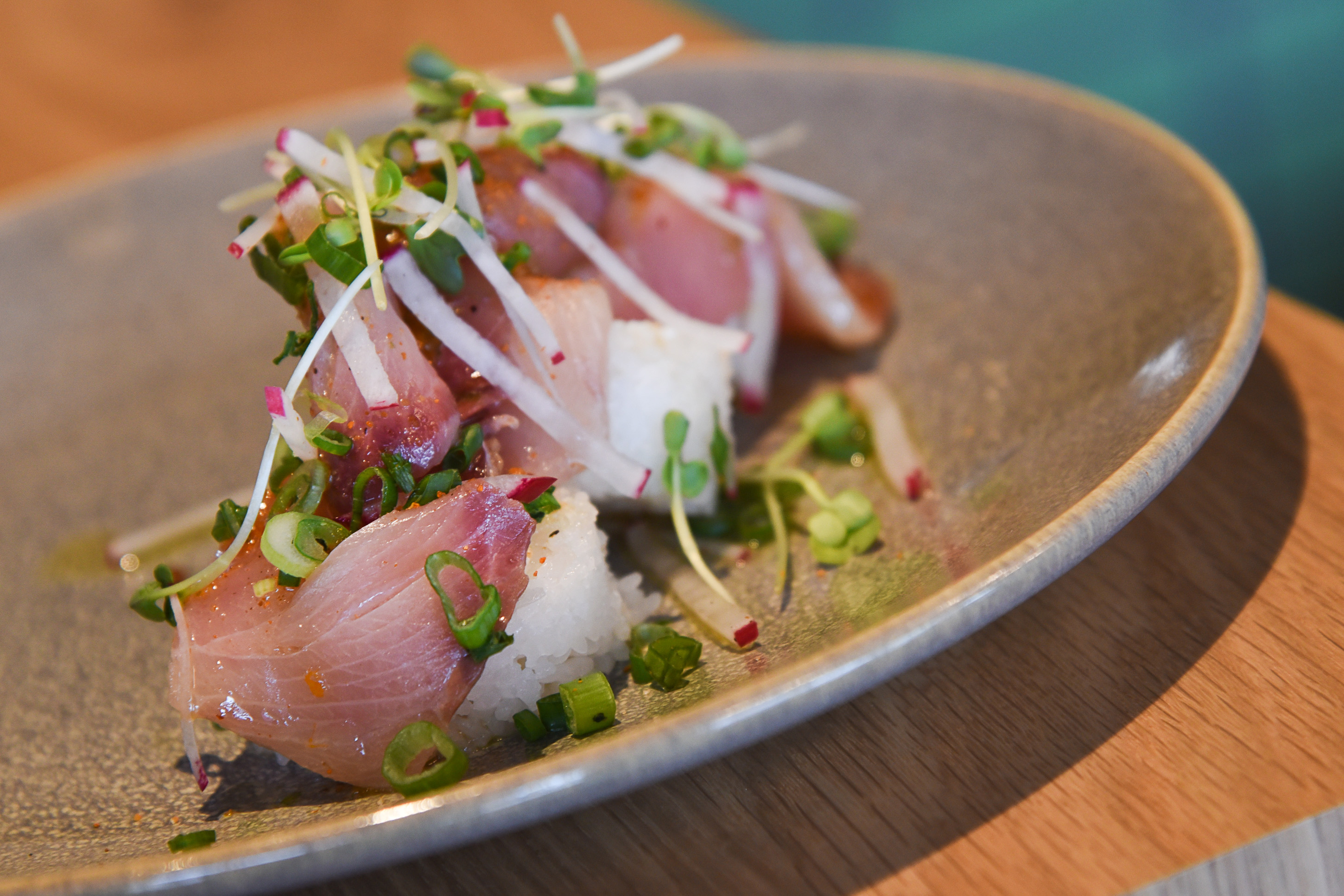 (Francisco Kjolseth | The Salt Lake Tribune) Hamachi crudo with chile, lime, scallion, white soy, and toasted sushi rice cake at Hearth & Hill a new restaurant in Kimball Junction that serves upscale comfort food at 1153 Center Drive in the Newpark Retail Center is one of the new restaurants available to try before (or after) the Sundance Film Festival. 