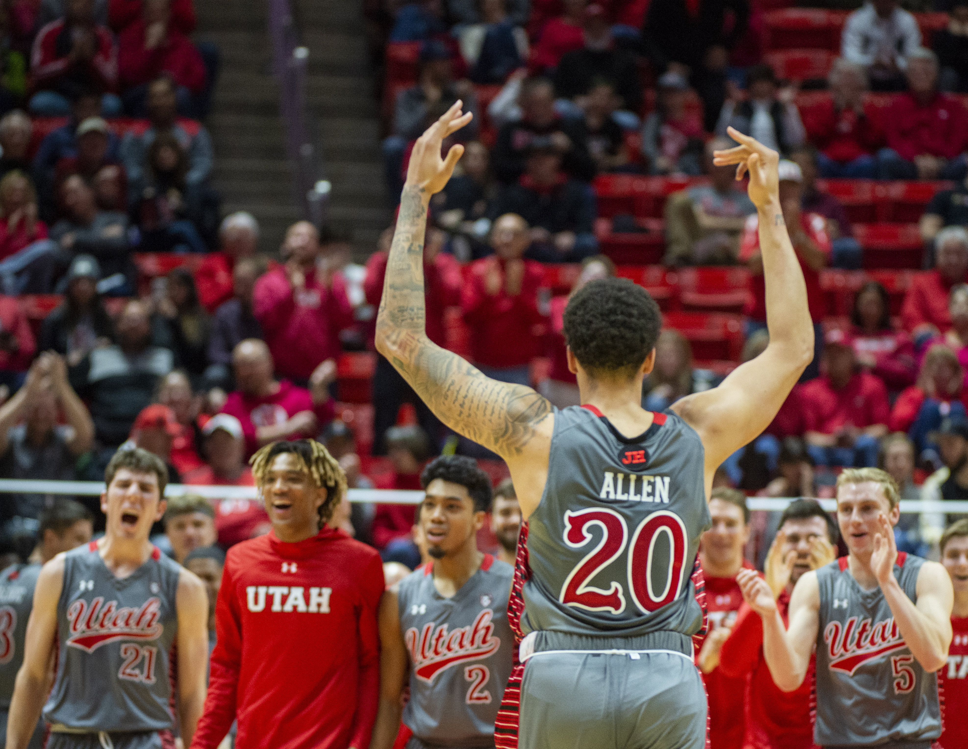 (Rick Egan | The Salt Lake Tribune) Utah Utes forward Timmy Allen (20) celebrates after the Utes jump out to a double digit lead early in the game, on back to back dunks, in PAC-12 basketball action between the Utah Utes and the Colorado Buffaloes at the Jon M. Huntsman Center, Sunday, Jan. 20, 2019. 