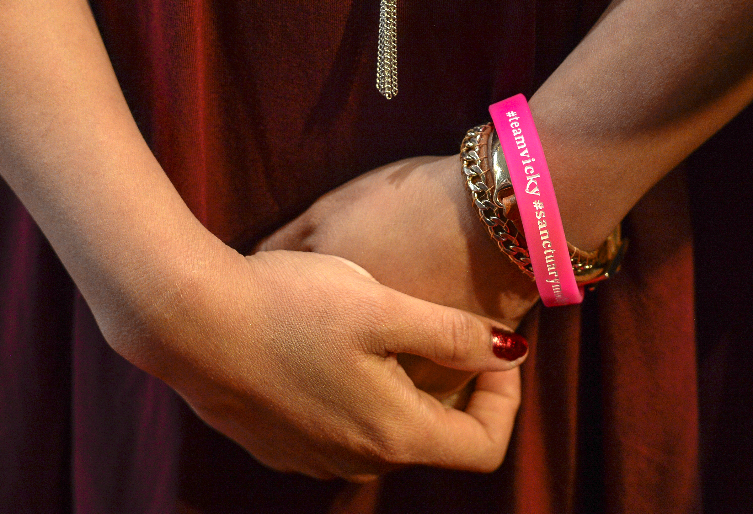 (Leah Hogsten | The Salt Lake Tribune) Vicky Chavez, a Honduran woman who has been living in a Utah church with her two daughters, photographed on July 9, 2018. Chavez wears a bracelet that reads: #teamvicky #sanctuarymothers #togethereverythingispossible