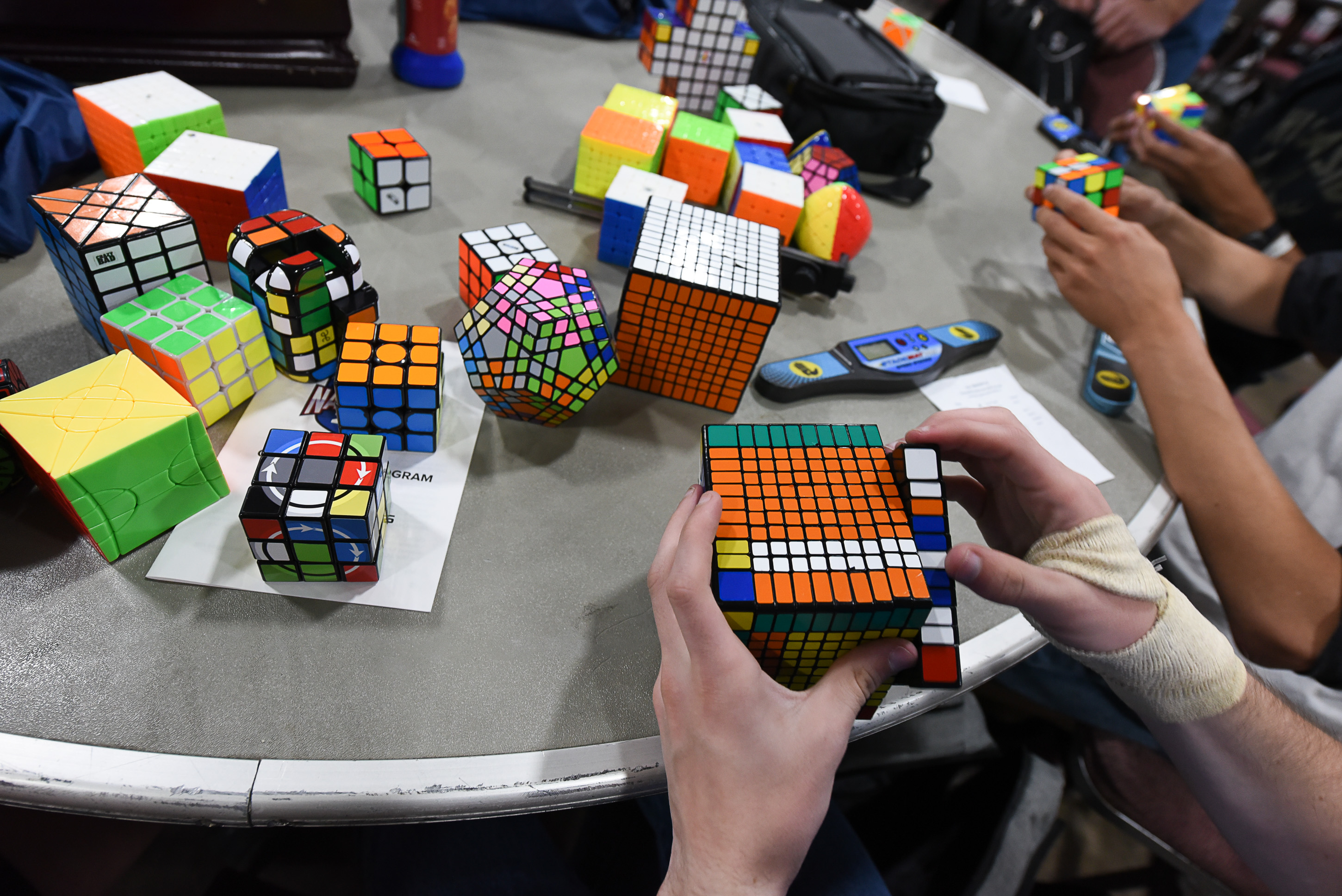 (Francisco Kjolseth | The Salt Lake Tribune) Jon Meilstrup, a student at BYU, nears completion of an 11x11 cube as he joins other enthusiasts during CubingUSA Nationals 2018 at the Salt Palace Convention Center in Salt Lake City on Saturday, July 28, 2018.