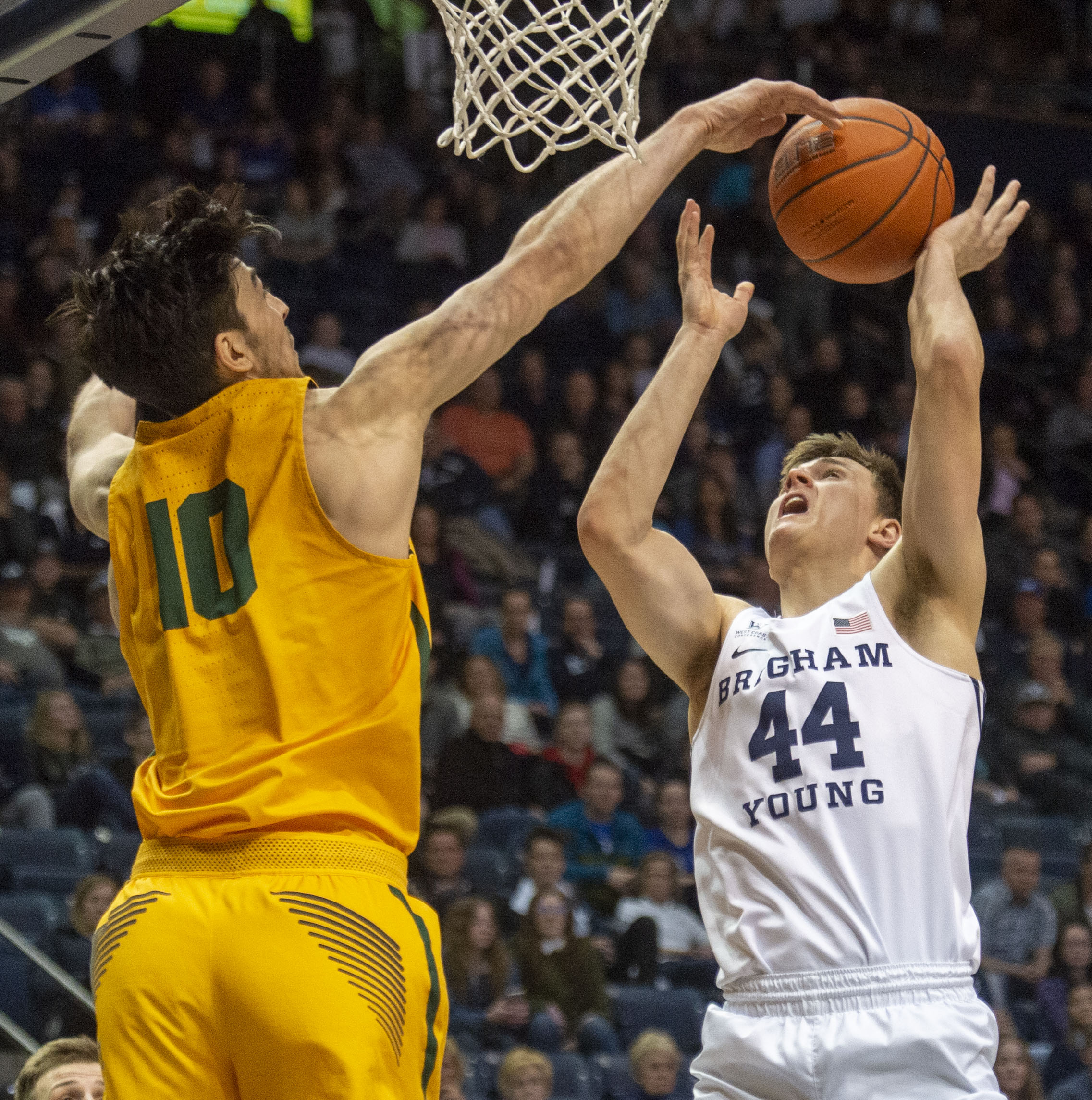 (Rick Egan | The Salt Lake Tribune) San Francisco Dons forward Matt McCarthy (10) blocks a shot by Brigham Young Cougars guard Connor Harding (44), in WCC basketball action between Brigham Young Cougars and San Francisco Dons, at the Marriott Center, Thursday, February 21, 2018. 