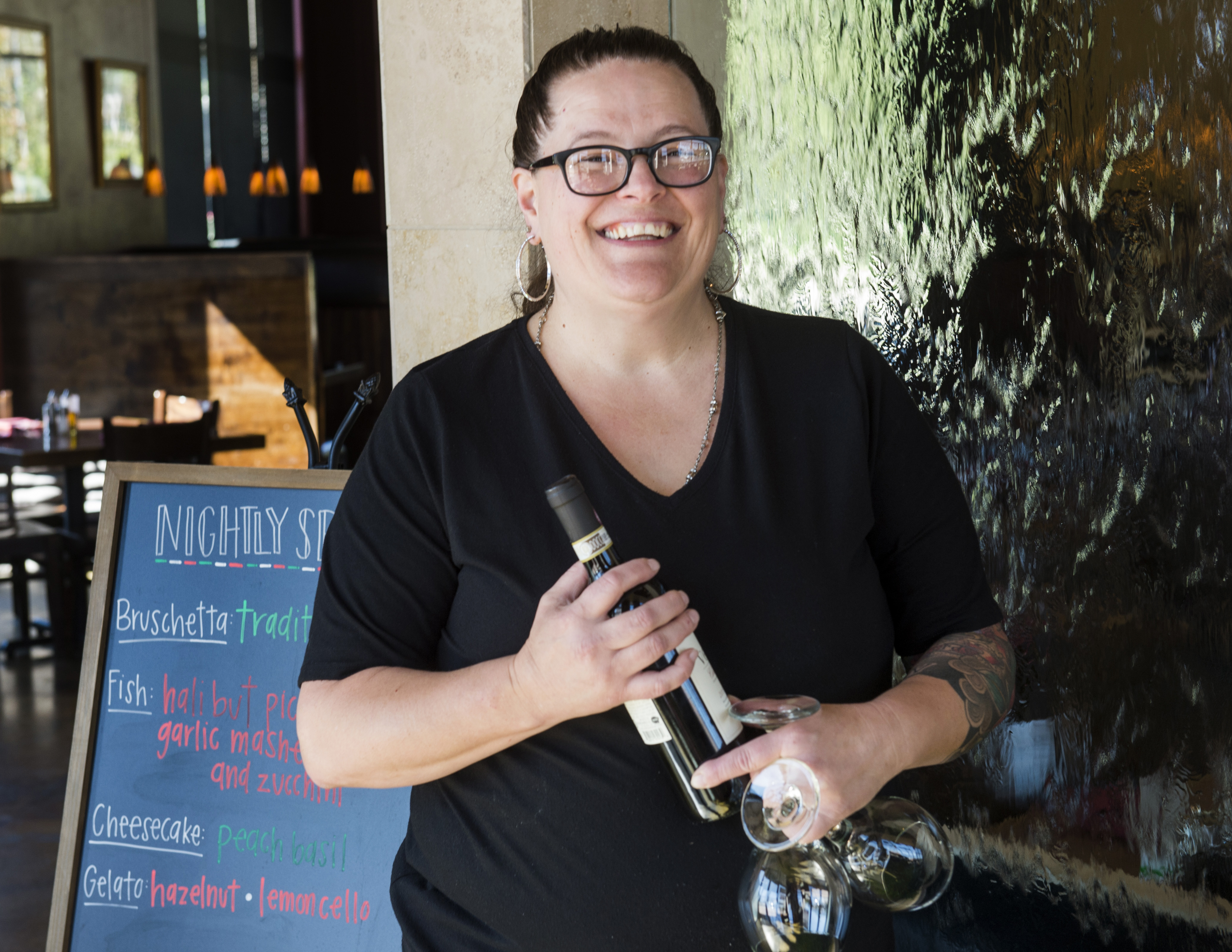 (Rick Egan | The Salt Lake Tribune) Waitress, Dounia Livingston, at Fratelli's Italian Ristorante, in Sandy, Thursday, Sept. 20, 2018. 