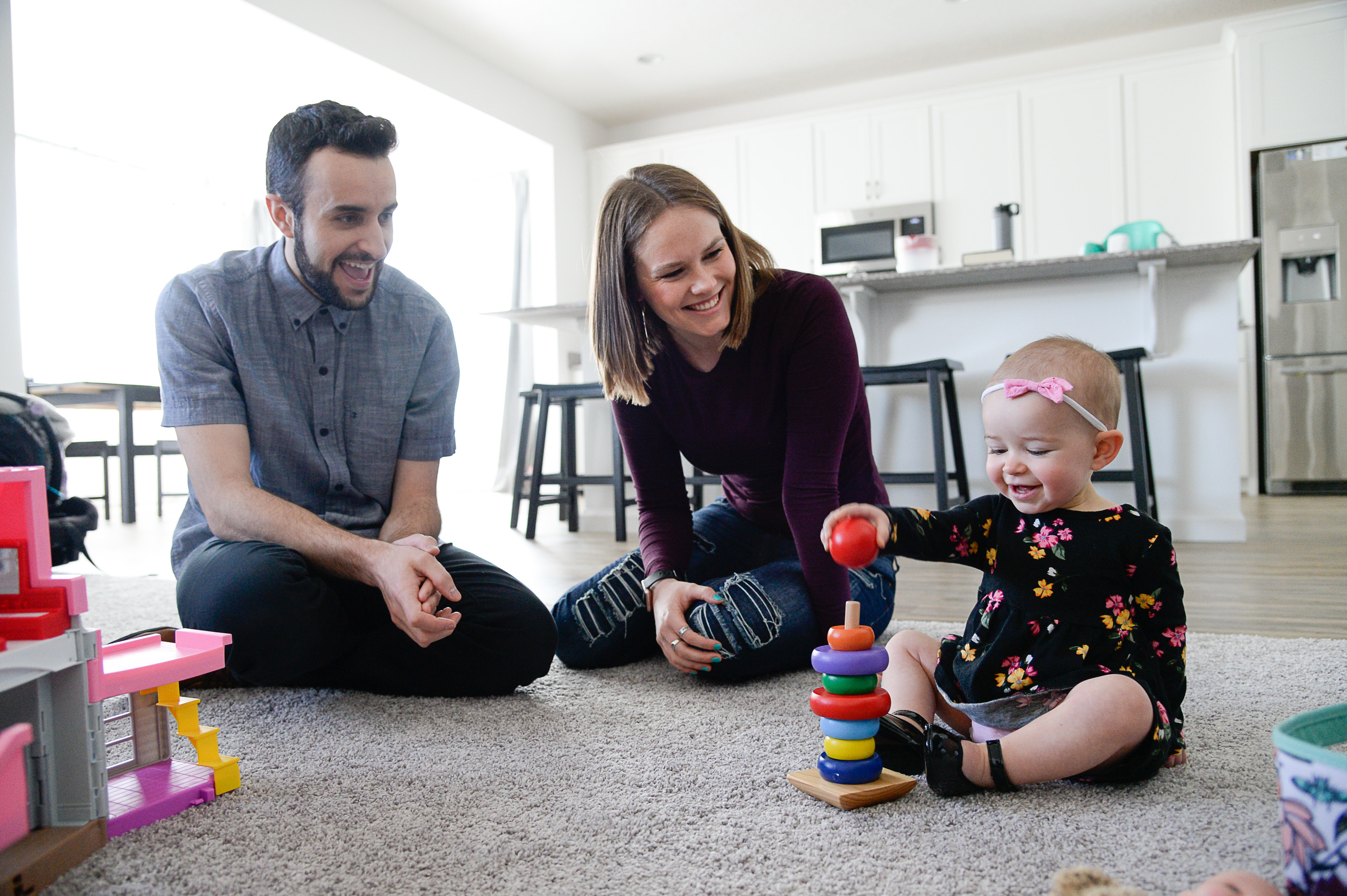 (Francisco Kjolseth | The Salt Lake Tribune) Jeremy and Ember Ulrich spend time with their daughter Jemma, 1, at their home in Lehi after moving from Pleasant Grove last October because they could get more house for their money there, and it's closer to Jeremy's job at Adobe in Lehi.