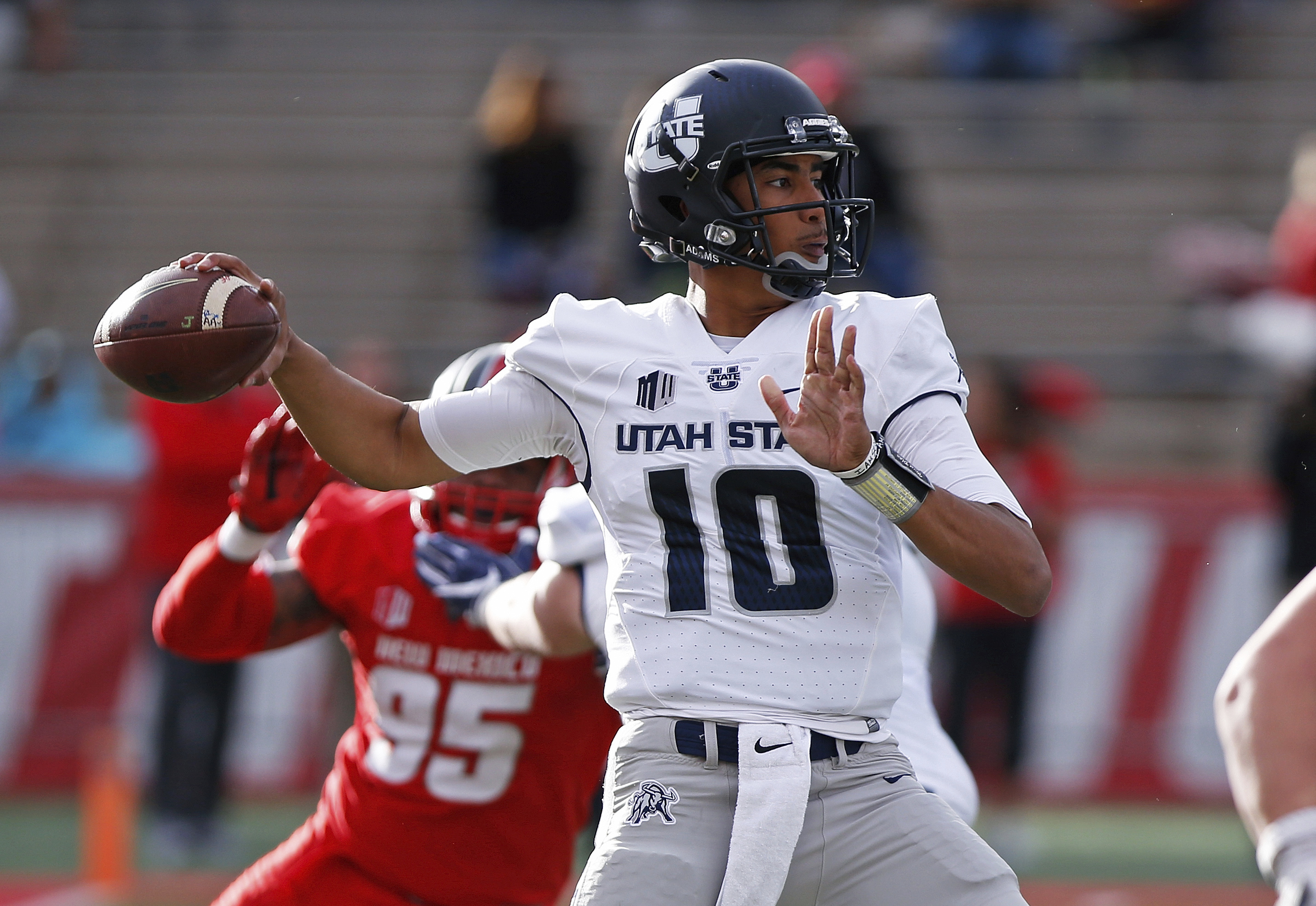 Quarterback Jordan Love's task this season is to help Utah State