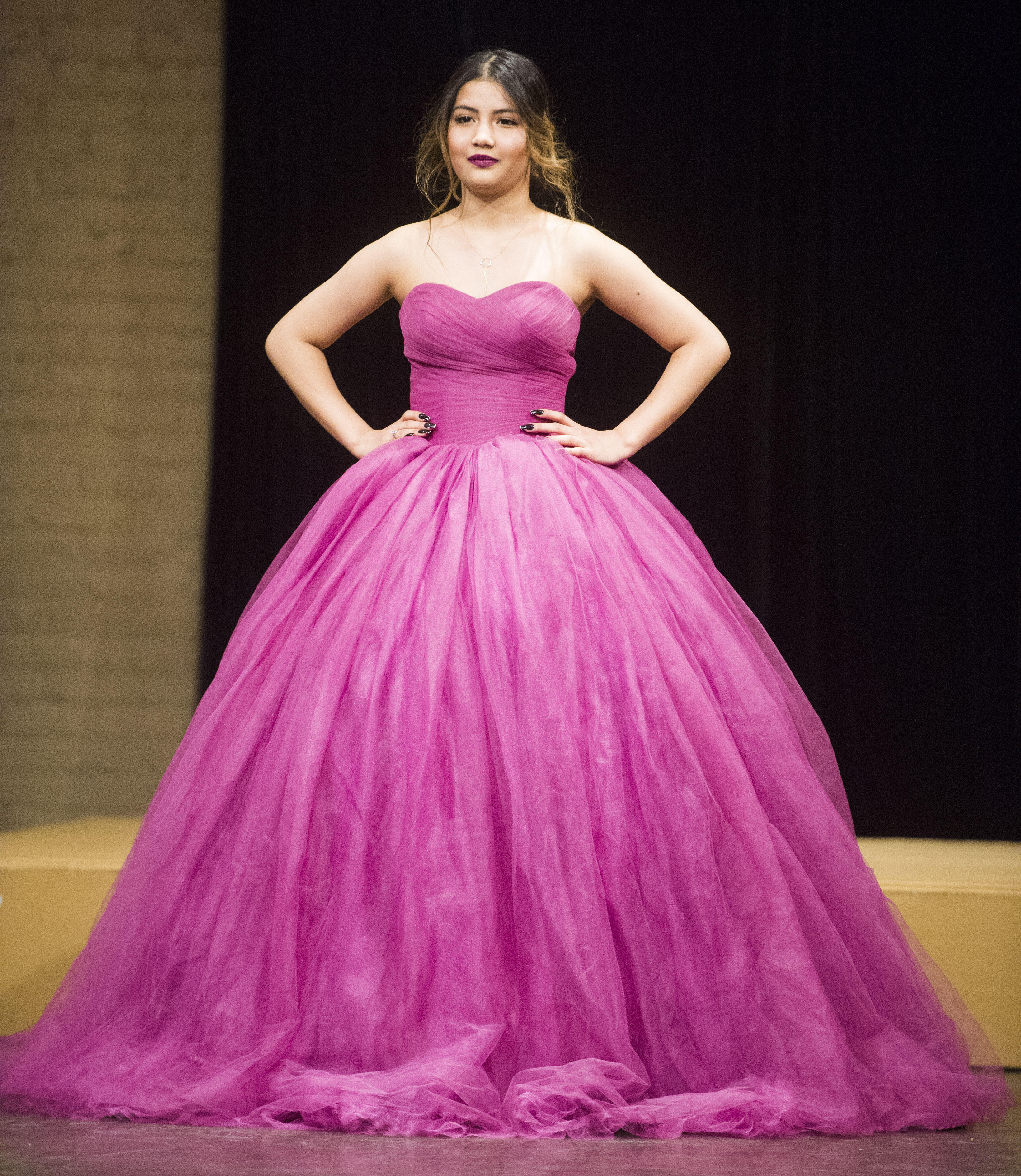 (Rick Egan | The Salt Lake Tribune) Arbiya, models a dress from Pakistan at the 8th Annual Women of the World Fashion Show. The fashion show fund is raiser for the non-profit that seeks to help refugees settle in a new culture. Wednesday, March 7, 2018. 