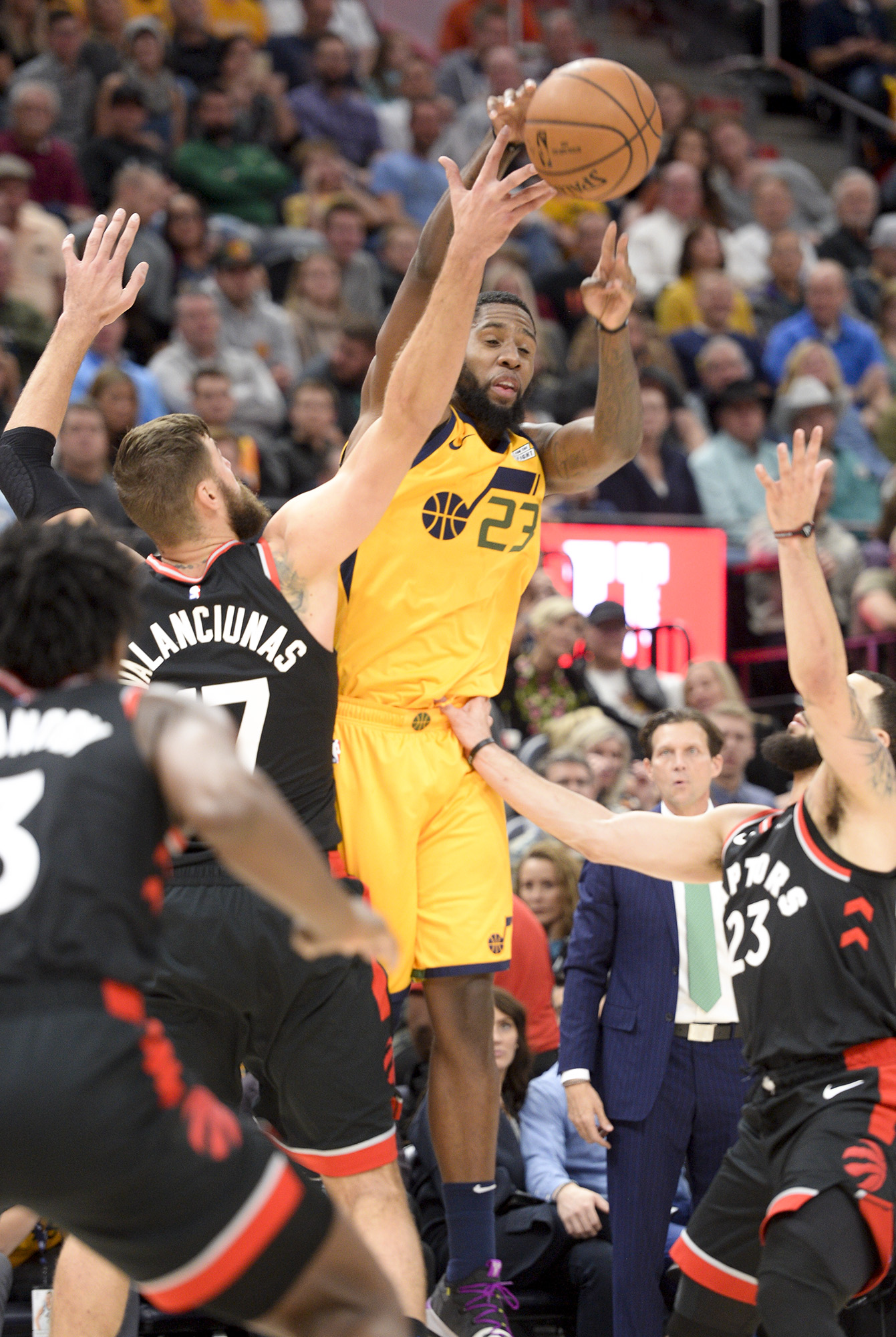 Leah Hogsten | The Salt Lake Tribune Utah Jazz forward Royce O'Neale (23) gets the ball knocked out of his hands by Toronto Raptors center Jonas Valanciunas (17) as the Utah Jazz host the Toronto Raptors, Monday, Nov. 5, 2018 at Vivant Smart Home Arena.