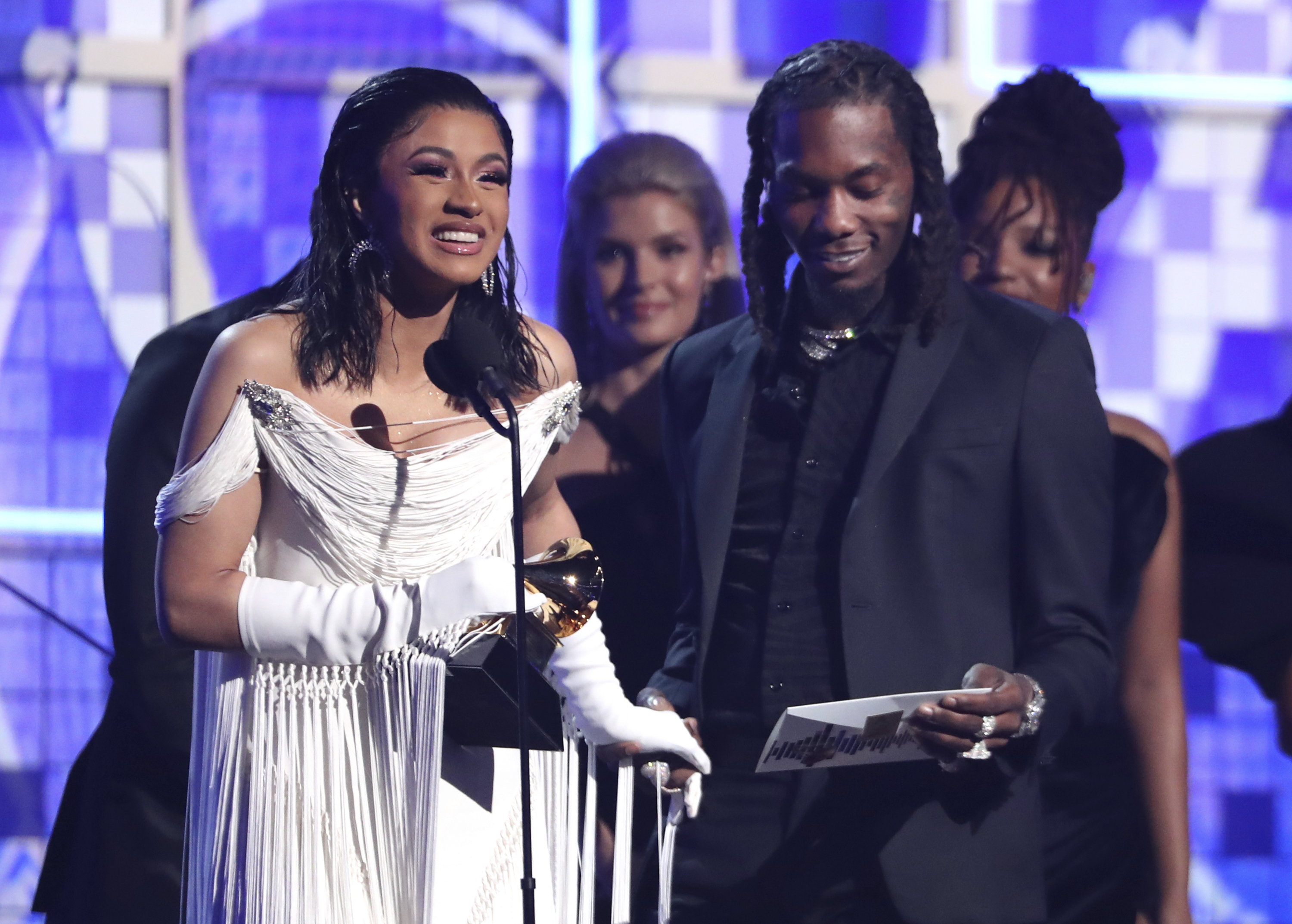 (Photo by Matt Sayles | Invision/AP) Cardi B, left, accepts the award for best rap album for "Invasion of Privacy" as Offset looks on at the 61st annual Grammy Awards on Sunday, Feb. 10, 2019, in Los Angeles.