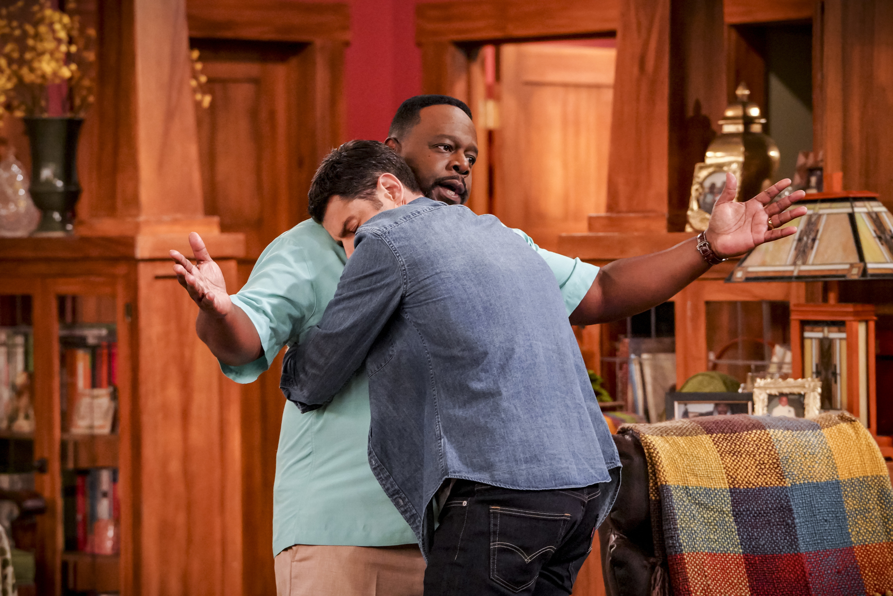 (Photo courtesy Bill Inoshita/CBS) Cedric the Entertainer and Max Greenfield in “The Neighborhood.”