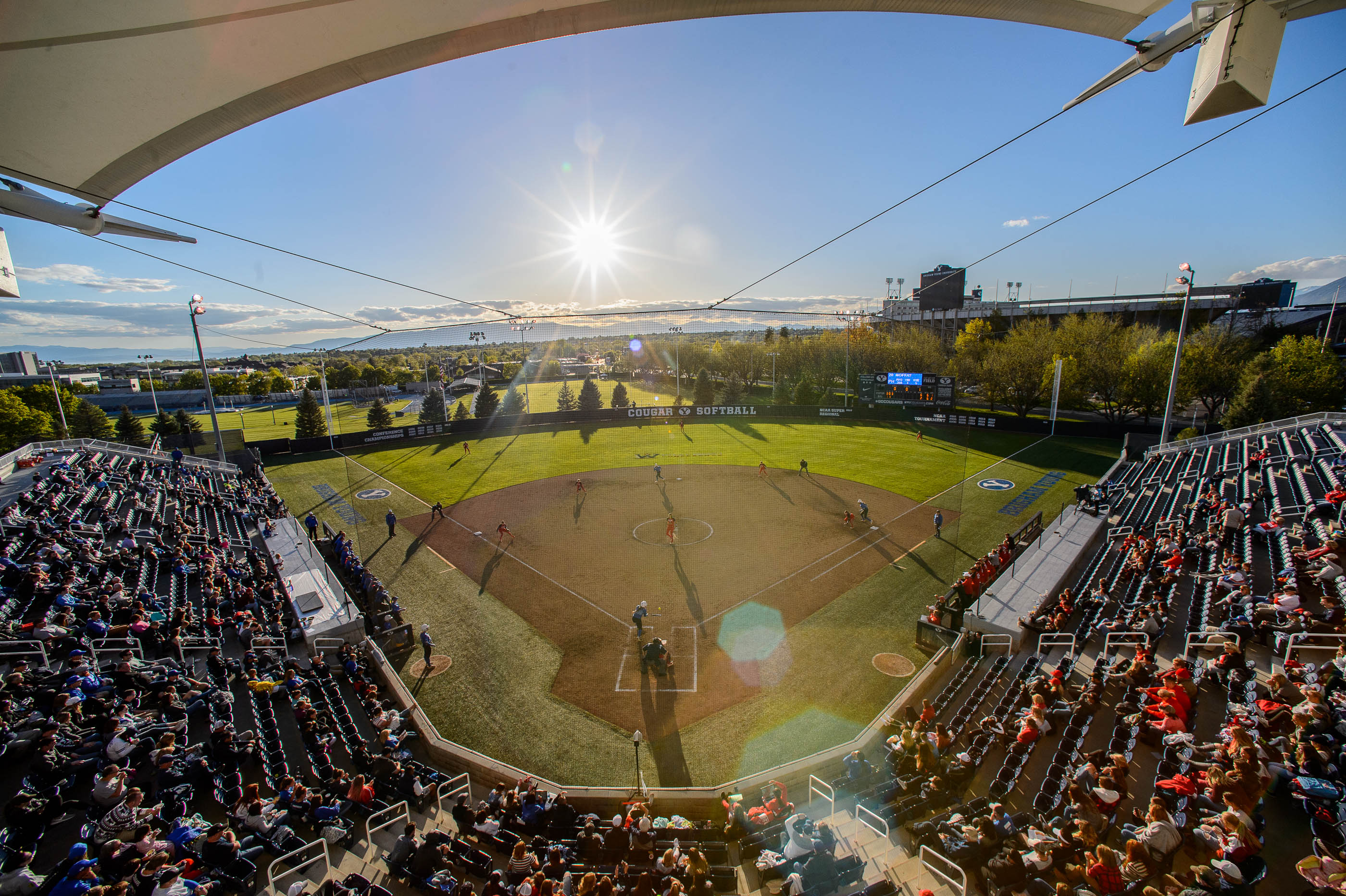 (Trent Nelson | The Salt Lake Tribune) The sun gets low as BYU hosts the University of Utah, NCAA softball in Provo on Wednesday May 1, 2019.