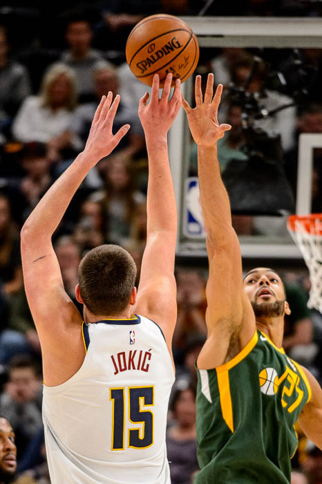 (Trent Nelson | The Salt Lake Tribune) Utah Jazz center Rudy Gobert (27) defending Denver Nuggets center Nikola Jokic (15) as the Utah Jazz host the Denver Nuggets, NBA basketball in Salt Lake City on Wednesday Jan. 23, 2019.