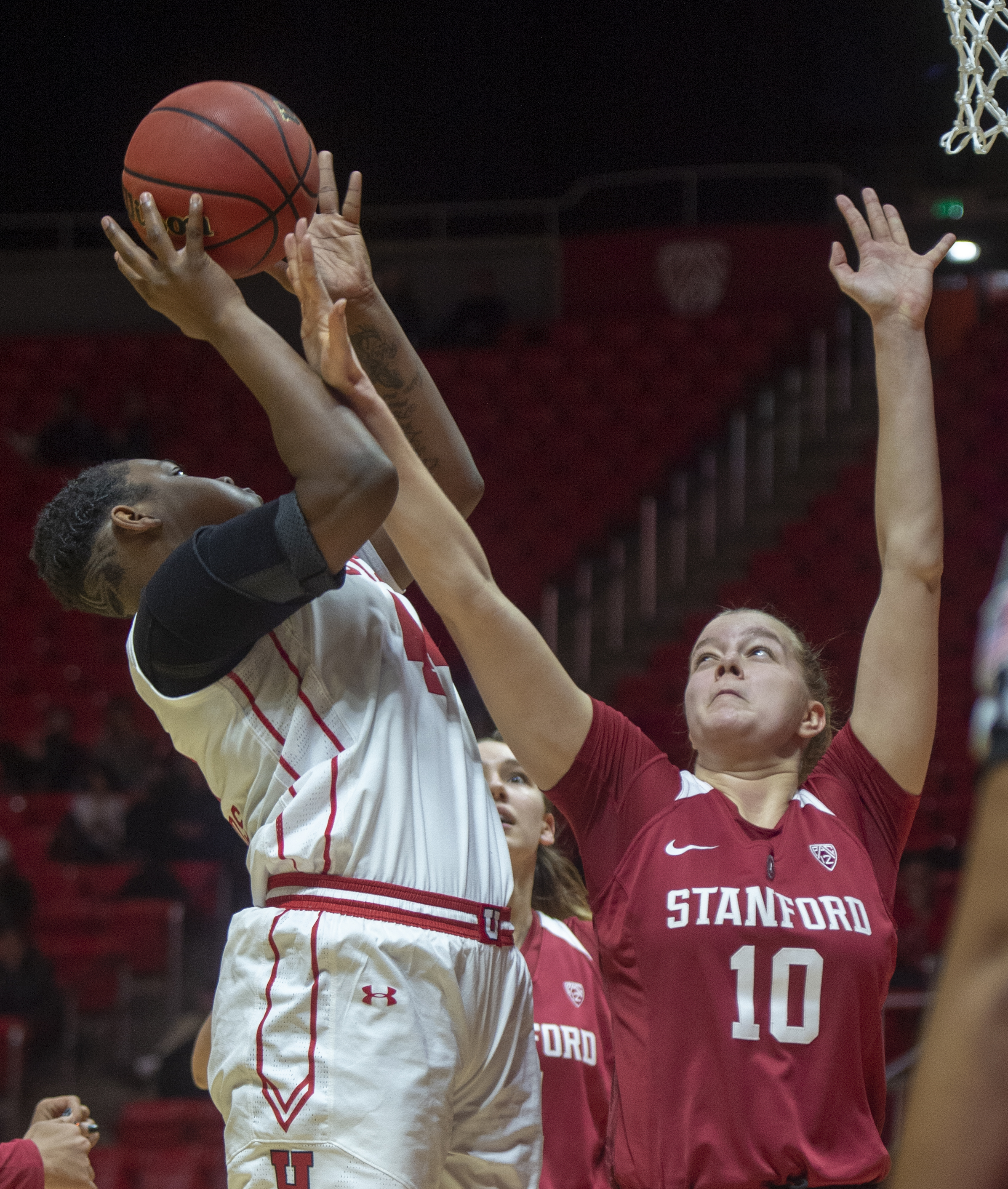 (Rick Egan | The Salt Lake Tribune) Utah Utes guard/forward Dre'Una Edwards (44)shoots as Stanford Cardinal forward Alyssa Jerome (10) defends, in PAC-12 action between the Utah Utes and the Stanford Cardinals at the Jon M. Huntsman Center. Sunday, Jan. 27, 2019. 