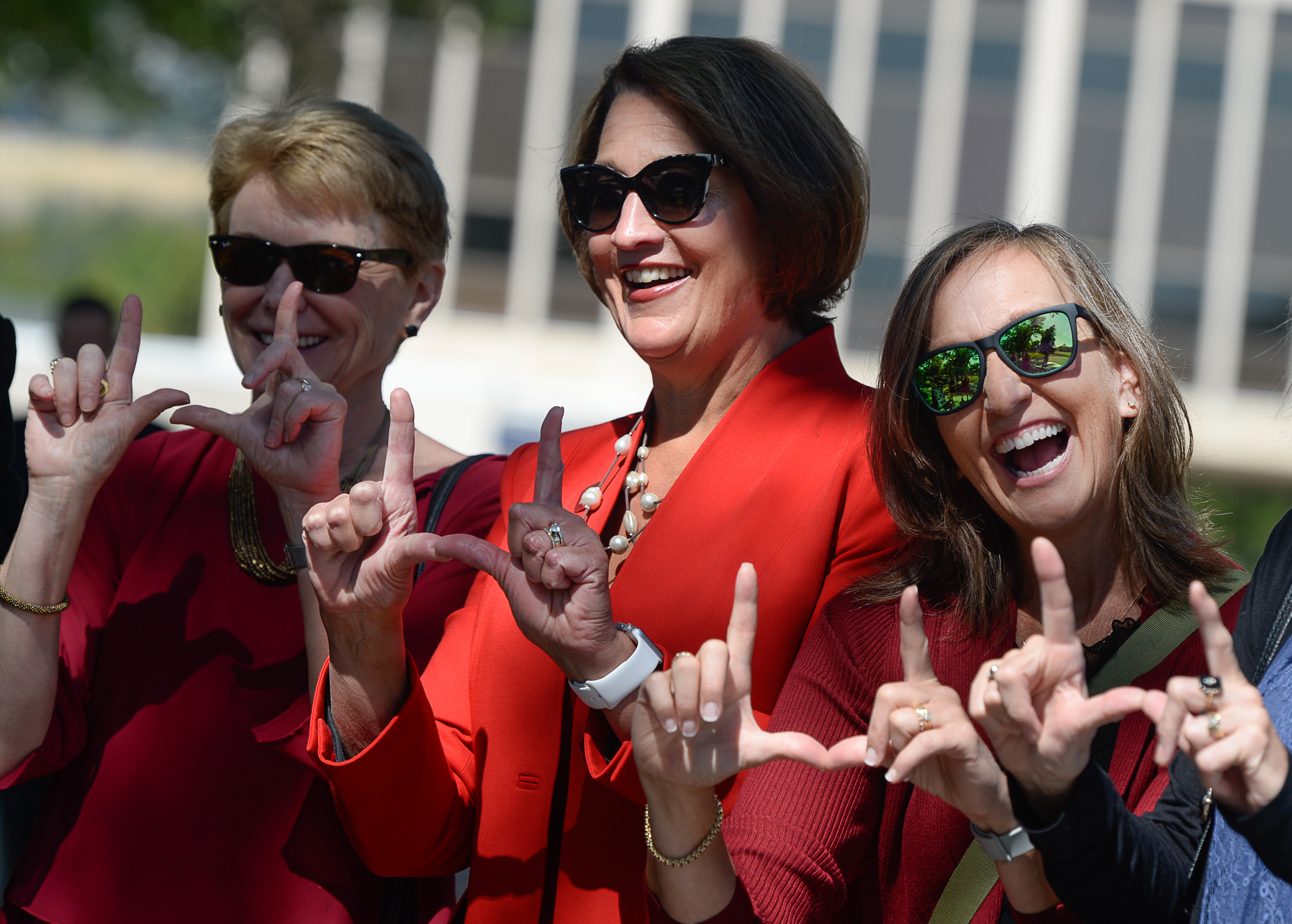 (Francisco Kjolseth | The Salt Lake Tribune) Ruth Watkins, center, flashes the "U" sign with academic friends from Illinois, Sarah Mangelsdorf, left, and Robin Kaler before Watkins was inaugurated as the University of Utah's 16th president, and first female, at Kingsbury Hall on Friday, Sept. 21, 2018.