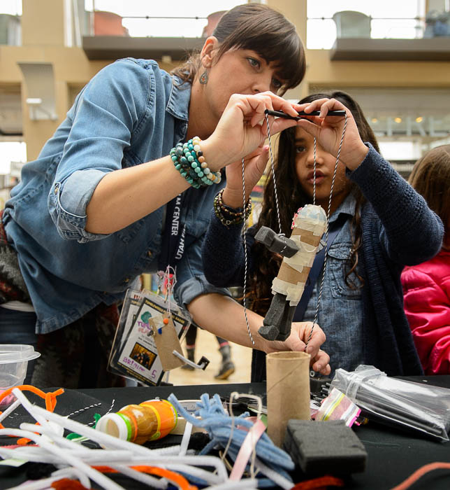 (Trent Nelson | The Salt Lake Tribune) Beth Kerr and Maya Perez create a marionette at the Tumbleweeds Film Festival in Salt Lake City, Saturday March 3, 2018.