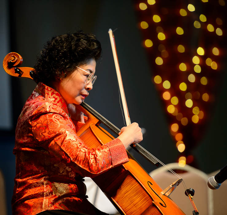 (Trent Nelson | The Salt Lake Tribune) Ying Huang plays the cello with the Utah Chinese Folk Orchestra performs at the Chinese New Year Celebration at the County Library's Viridian Event Center in West Jordan, Saturday Feb. 17, 2018.