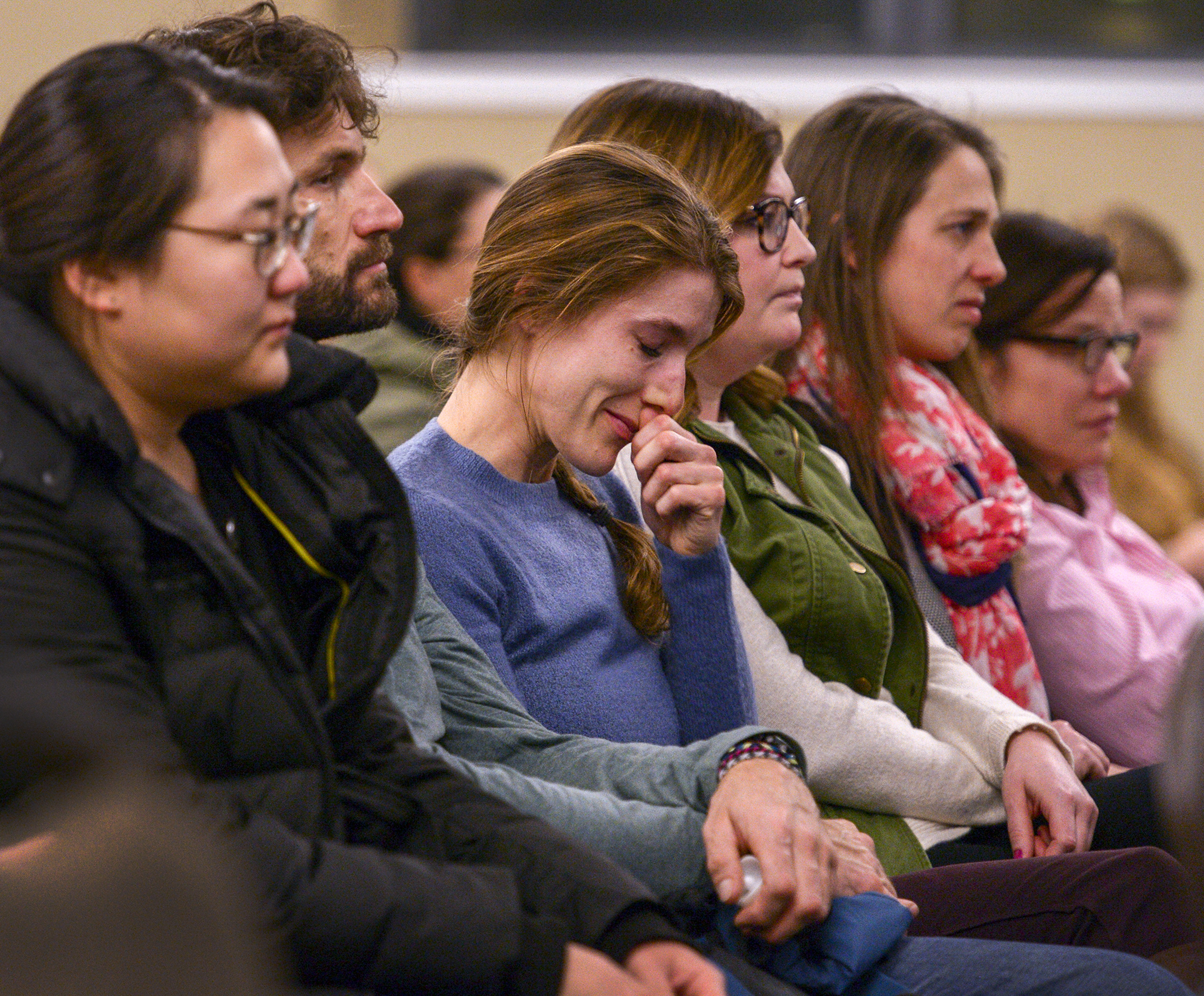Leah Hogsten | The Salt Lake Tribune Julia Kammel, center, weeps as fellow medical interns and faculty recount stories and memories in honor of the life of Sarah Hawley during a University of Utah's School of Medicine's candlelight vigil, Feb. 4, 2019. On Jan. 27, 2019 Salt Lake City police found 27-year-old physician Sarah Hawley and her boyfriend, Travis Geddes, dead at their Sugar House home. Geddes, 30, shot Hawley before killing himself.