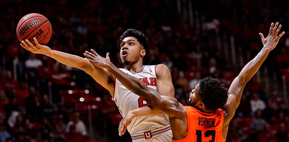 (Trent Nelson | The Salt Lake Tribune) Utah Utes guard Sedrick Barefield (2) shoots with Oregon State Beavers guard Antoine Vernon (13) defending as Utah hosts Oregon State, NCAA basketball in Salt Lake City on Saturday Feb. 2, 2019.