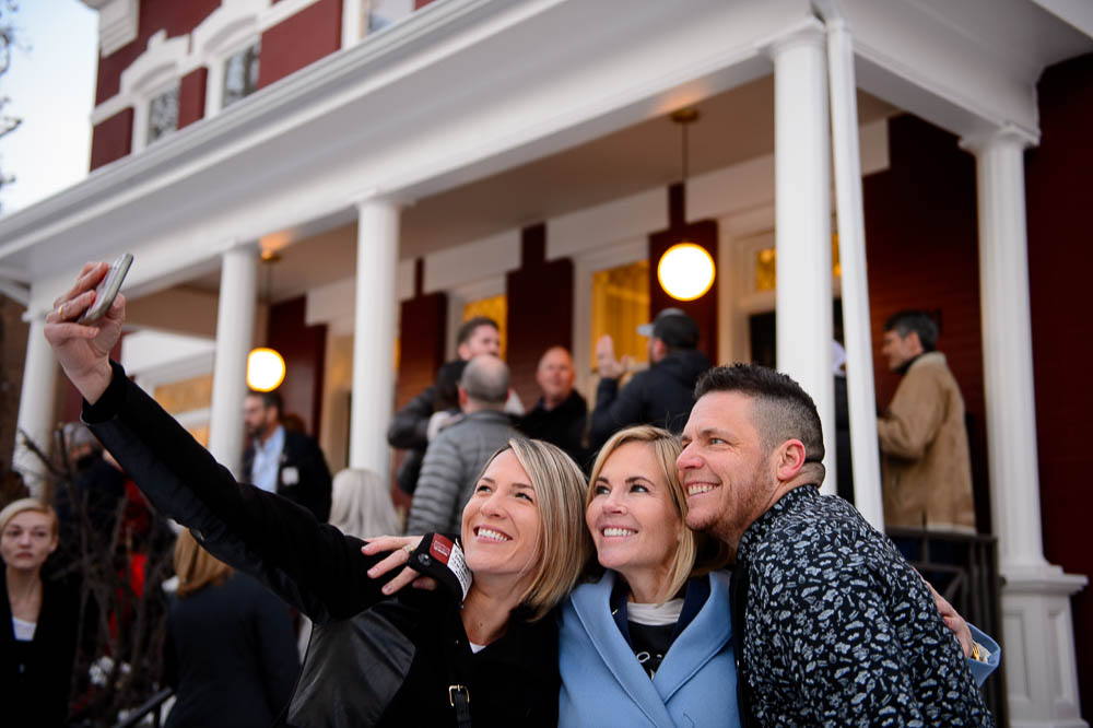 (Trent Nelson | The Salt Lake Tribune) Stephenie Larsen, center, poses for a photo with Kaylene and Kris Packer as Encircle: LGBTQ+ Family and Youth Resource Center opens its second location in Salt Lake City on Friday February 8, 2019. Larsen is the founder of Encircle.
