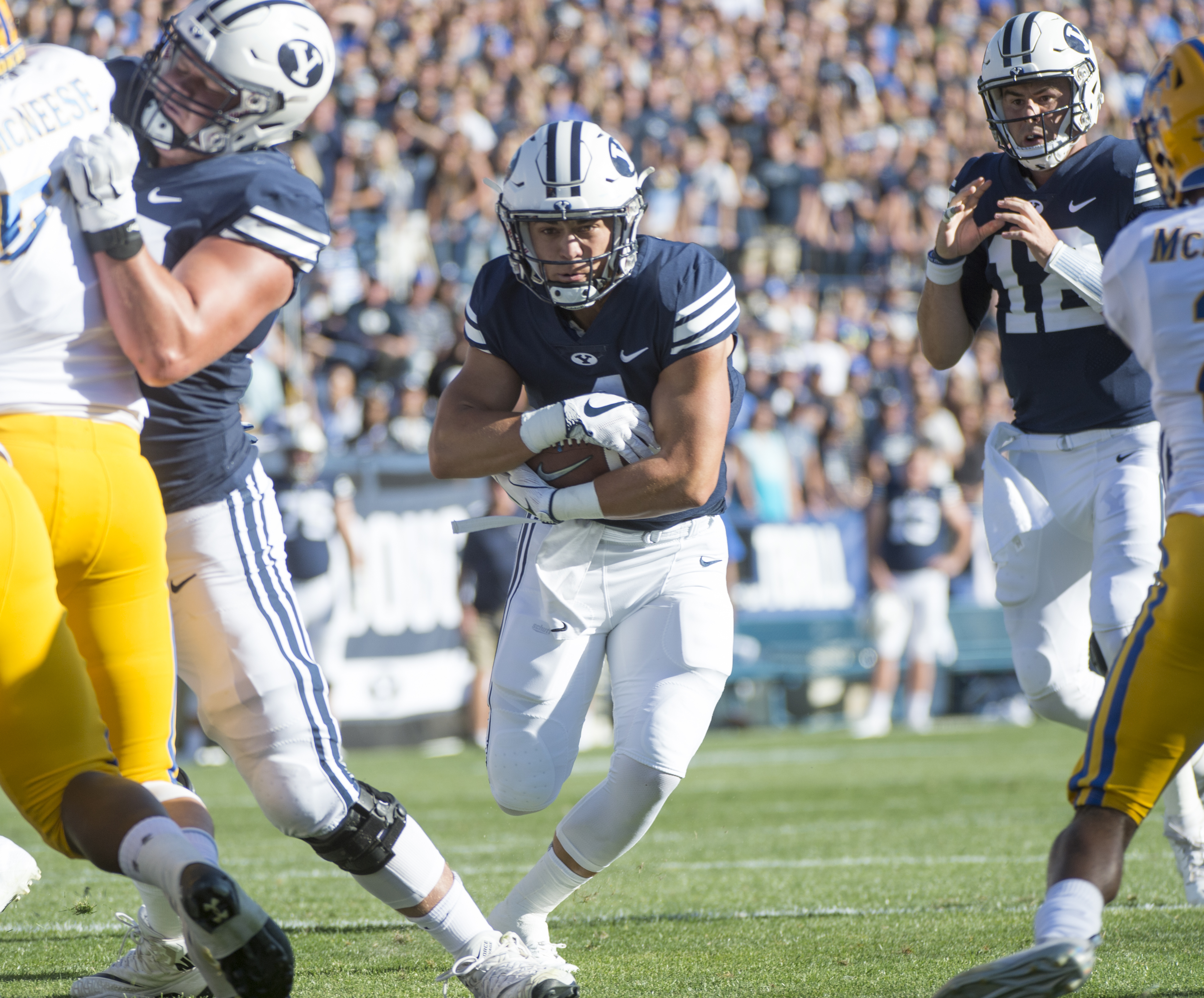(Rick Egan | The Salt Lake Tribune) Brigham Young Cougars running back Lopini Katoa (4) scores his first of two second quarter touchdowns, in football action Brigham Young Cougars vs McNeese State Cowboys at Lavell Edwards Stadium, Saturday, Sept. 22, 2018. 