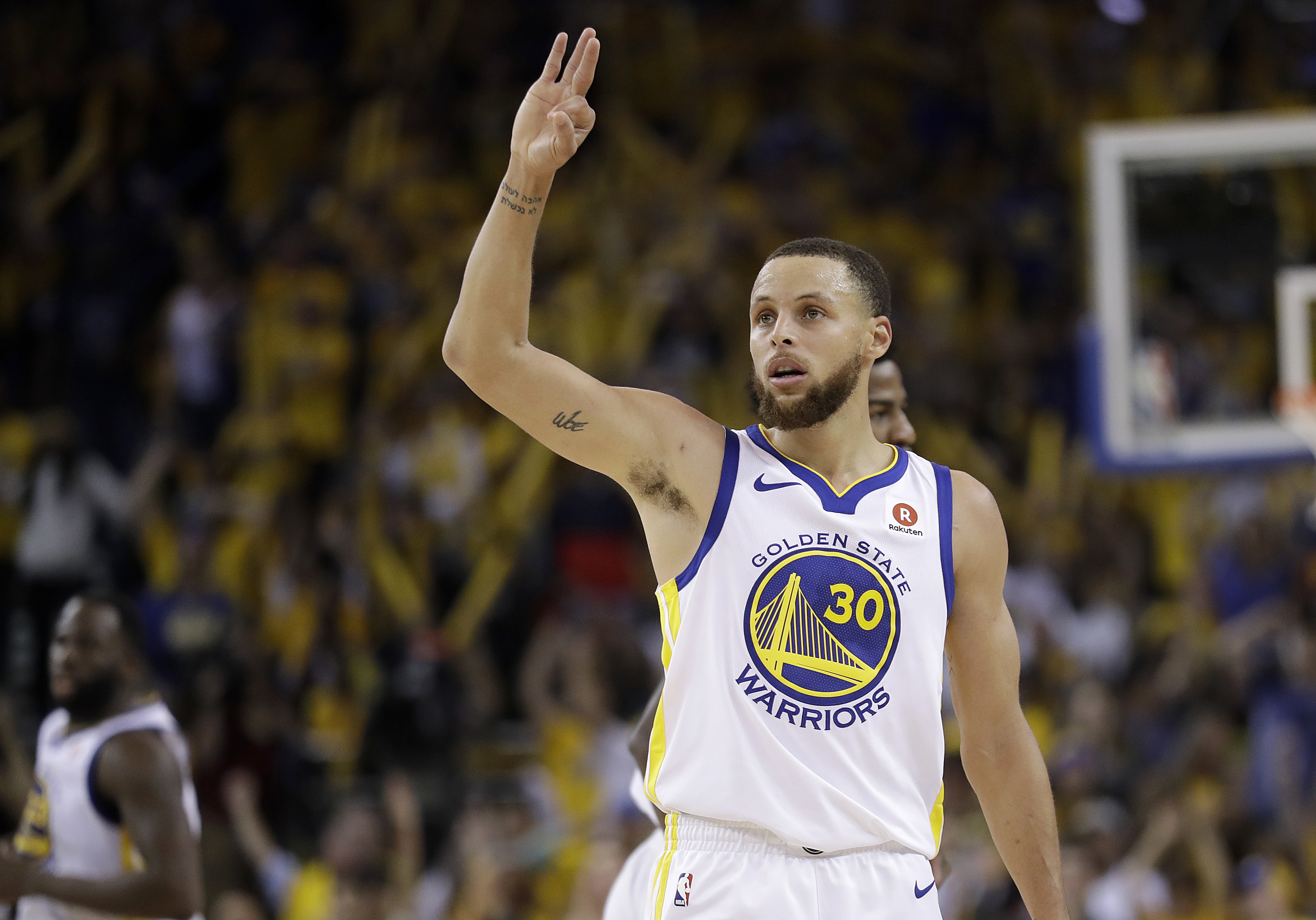 FILE - In this May 26, 2018, file photo, Golden State Warriors guard Stephen Curry (30) gestures during the second half of Game 6 of the NBA basketball Western Conference Finals against the Houston Rockets, in Oakland, Calif. The odds are longer than a Stephen Curry 3-pointer. The Cavaliers are being given little _ or no _ chance in their fourth straight NBA Finals against the Golden State Warriors, who have been installed by Las Vegas as the biggest favorites in 16 years. (AP Photo/Marcio Jose Sanchez, File)