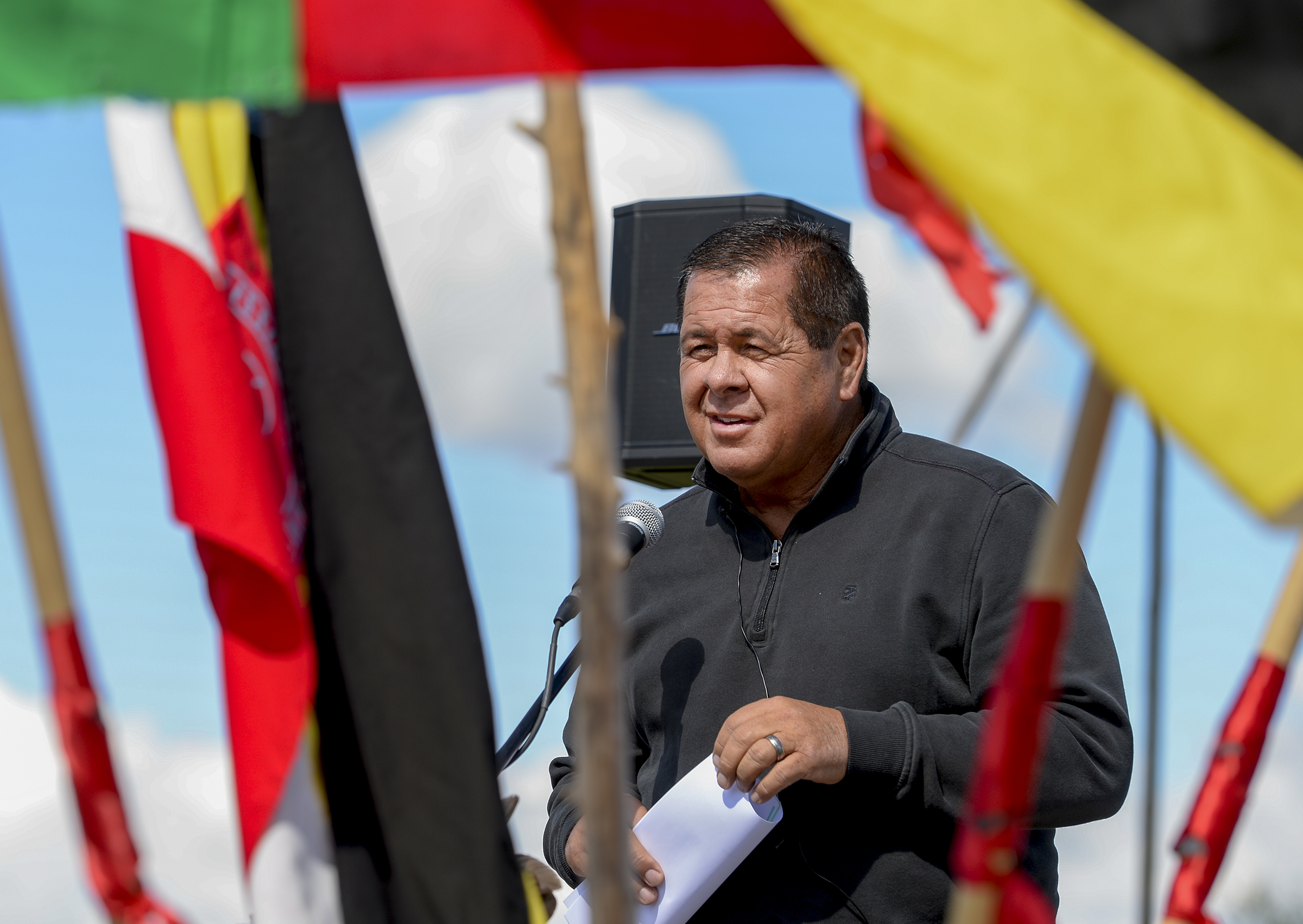 Leah Hogsten | The Salt Lake Tribune Darren Parry, chairperson of the Northwestern Band of Shoshone addresses the crowd. The "Stop the Polluting Port" community coalition staged a May Day celebration, calling for respect and awareness of the water, earth and air regarding the 20,000 acres west of Salt Lake City where the inland port industrial site has been proposed.
