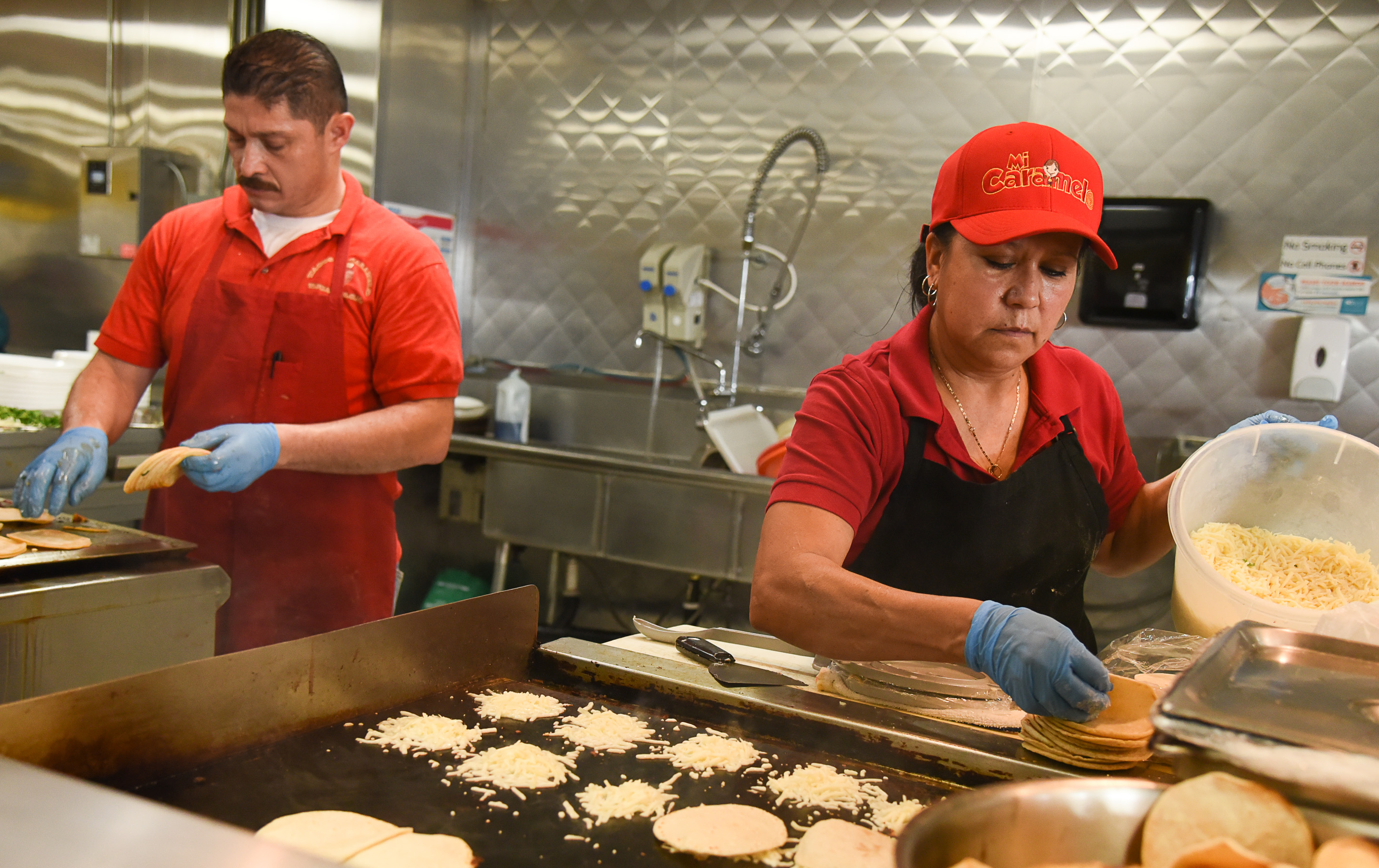 (Francisco Kjolseth | The Salt Lake Tribune) Raul Aispuro and Lorena Torres fix tacos and fresh made tortillas at Tacos Mi Caramelo, a late-night taqueria that is open until 2 a.m. most nights and 24-hours a day on Friday and Saturday.