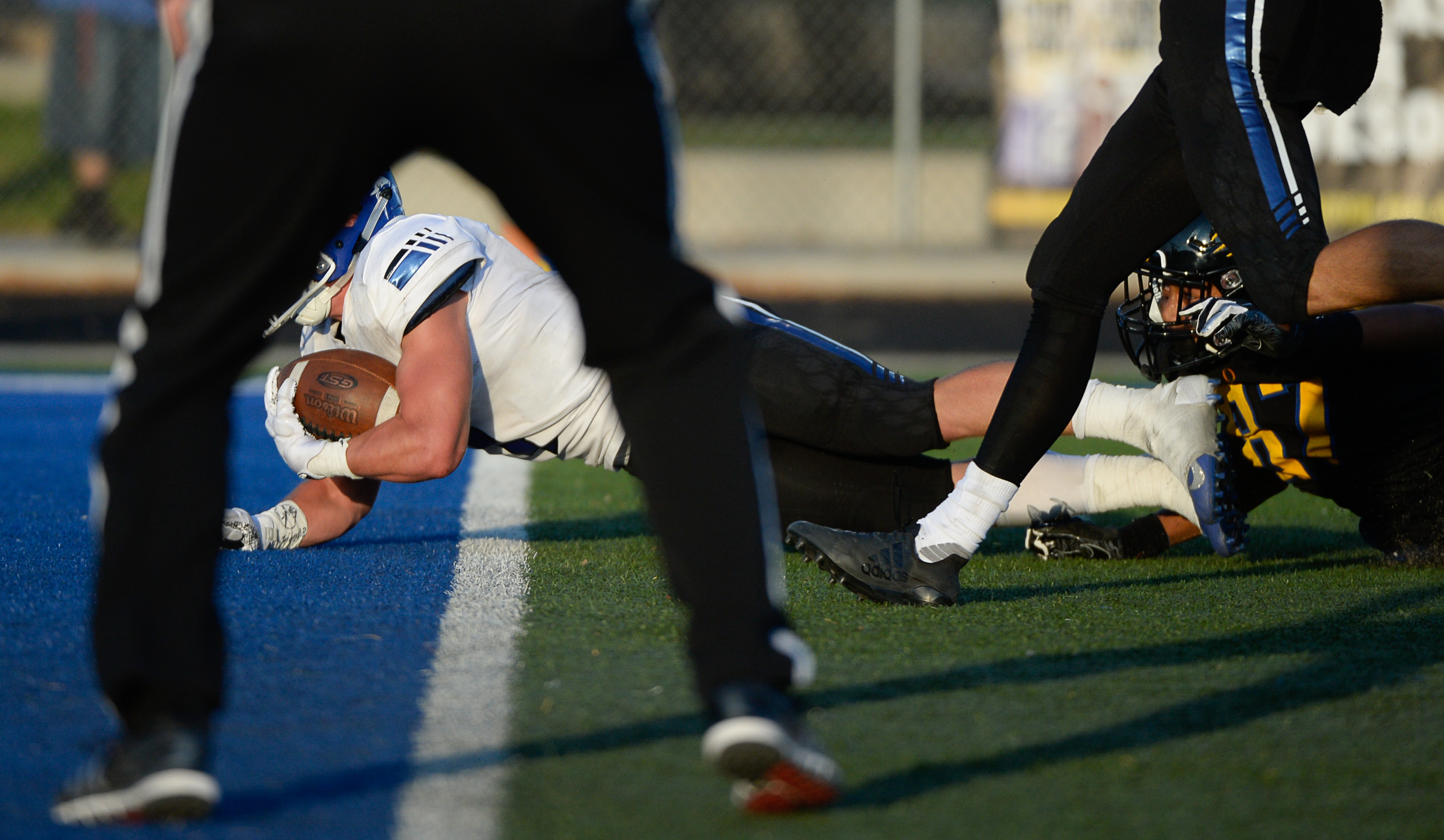 (Francisco Kjolseth | The Salt Lake Tribune) Bingham's Braedon Wissler slips into the end zone for a touchdown in the first half of their game against Orem, Thursday, Aug. 16, 2018 in Orem.
