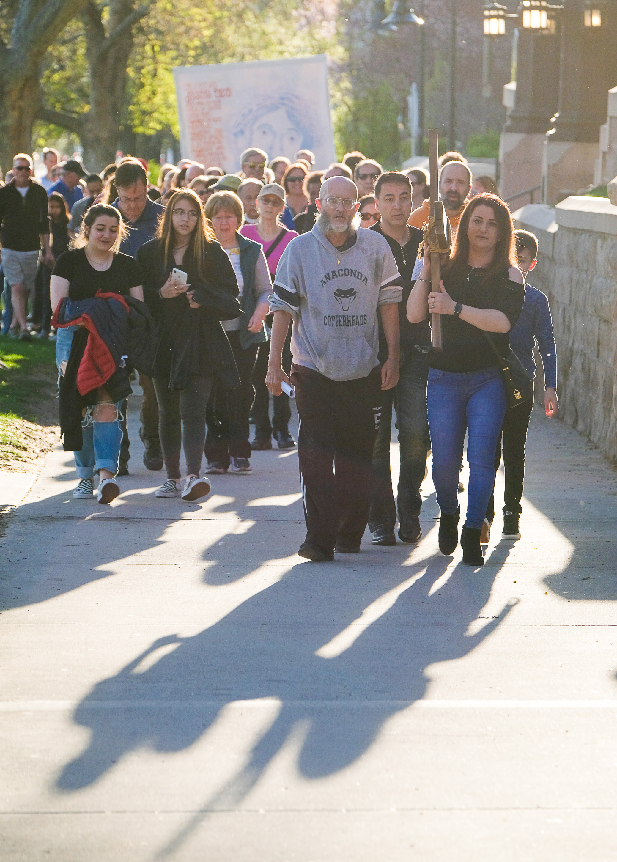 (Francisco Kjolseth | The Salt Lake Tribune) Christians march through streets of Salt Lake City on Good Friday to symbolically mark Jesus' carrying the cross to his crucifixion beginning at Cathedral of the Madeleine.