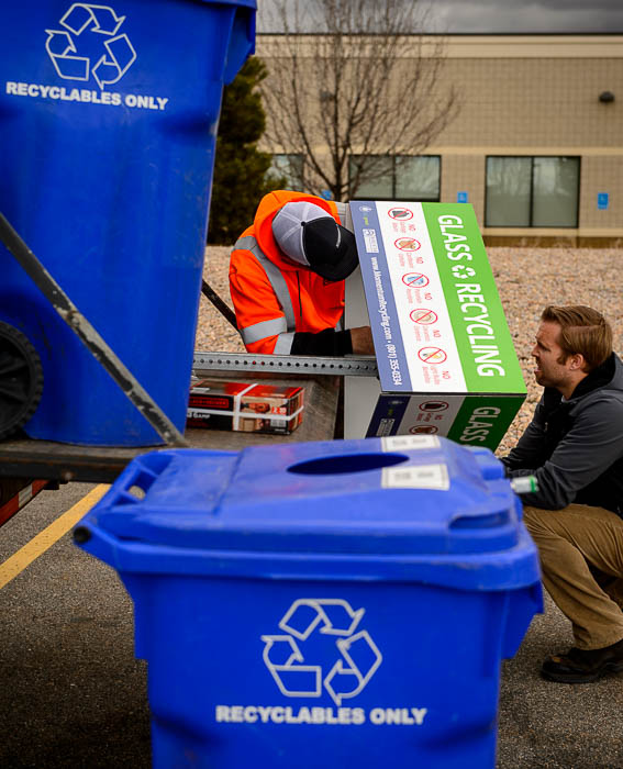 (Trent Nelson | The Salt Lake Tribune) Michael Gibbs and Jason Utgaard of Momentum Recycling install a glass recycling station at the State Wine Store in Salt Lake City, Tuesday, Feb. 6, 2018.