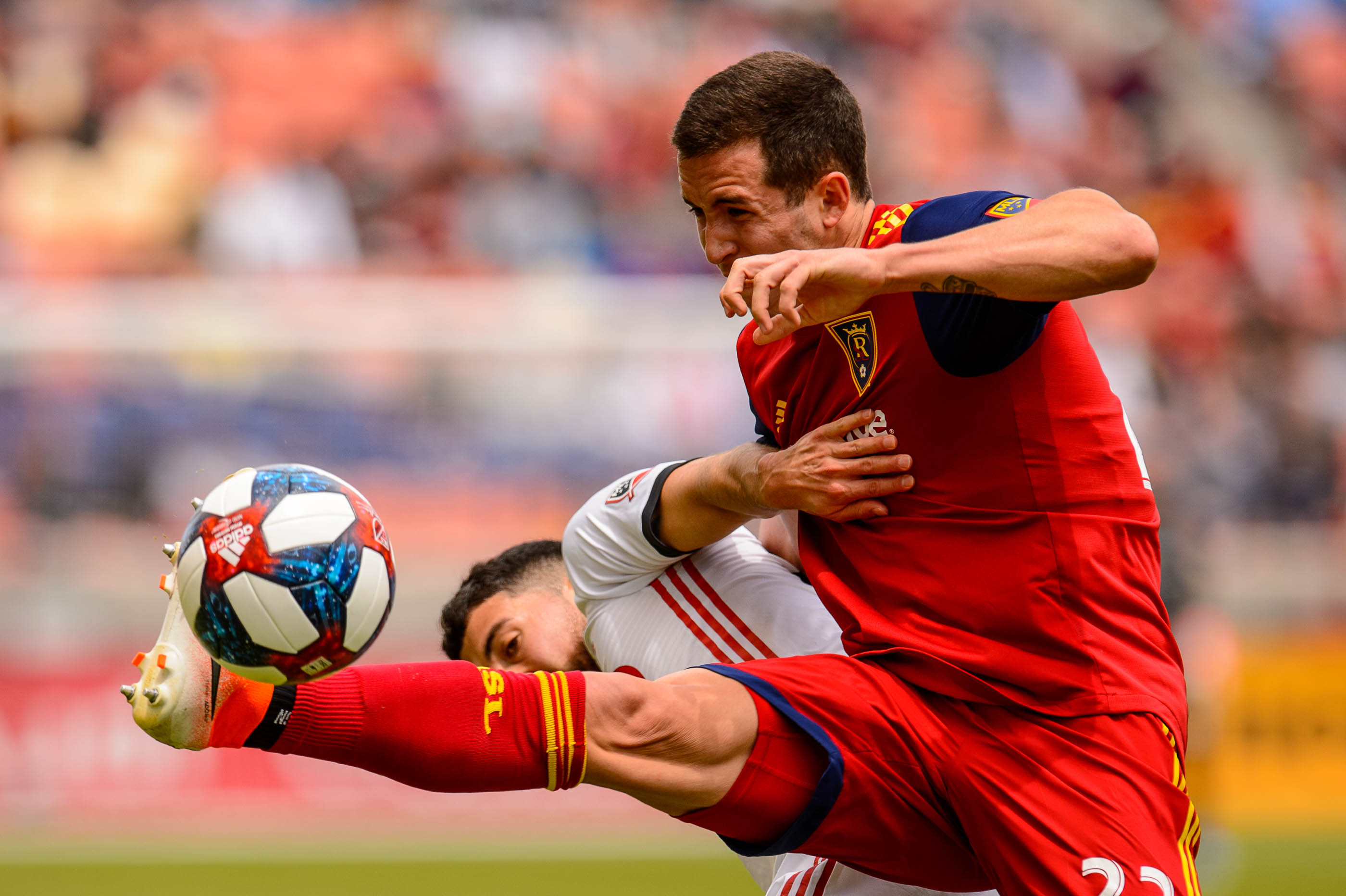 (Trent Nelson | The Salt Lake Tribune) Real Salt Lake defender Aaron Herrera (22) and Toronto FC midfielder Jonathan Osorio (21) as Real Salt Lake hosts Toronto FC, MLS Soccer at Rio Tinto Stadium in Sandy on Saturday May 18, 2019.