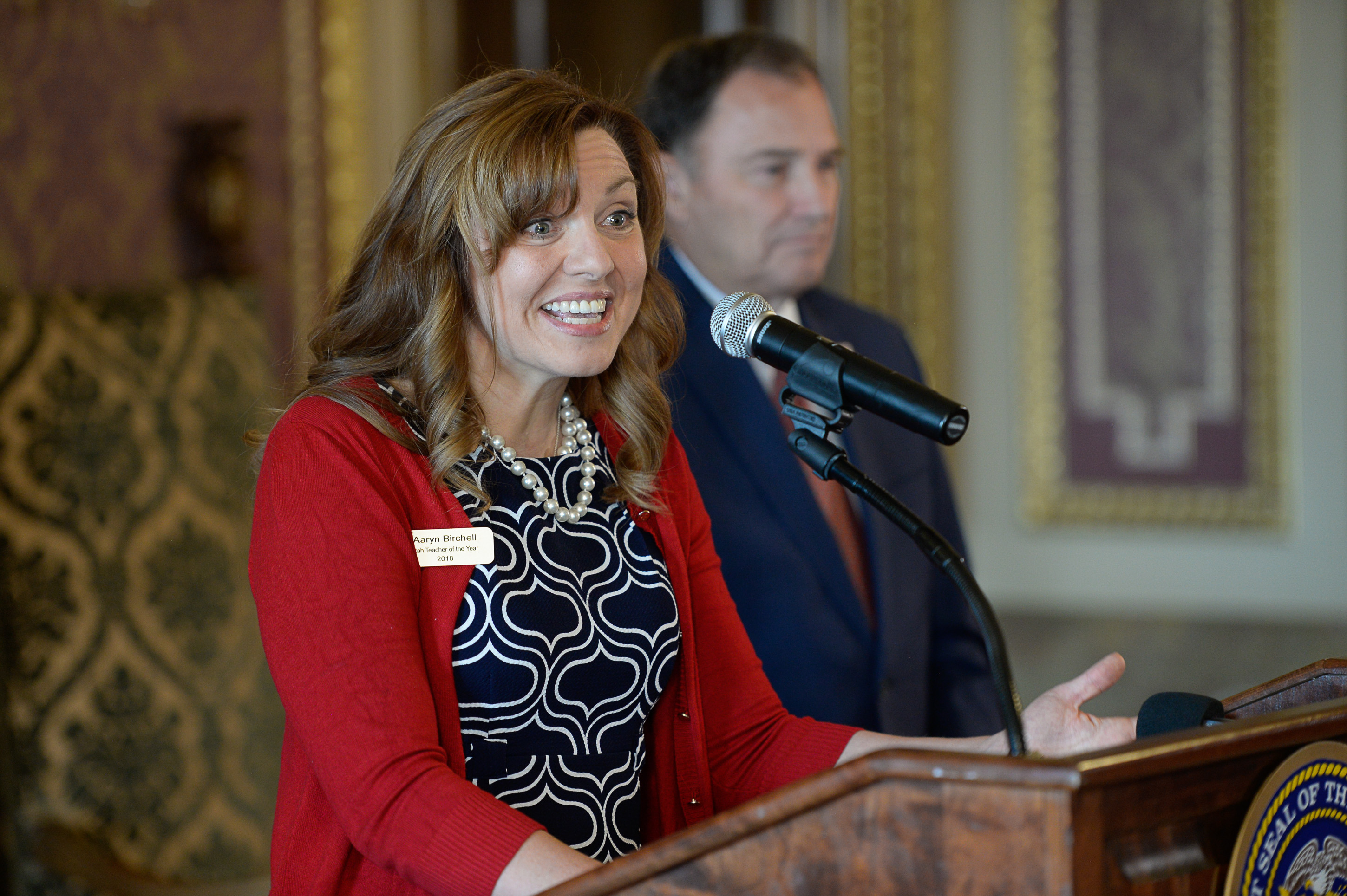(Francisco Kjolseth | The Salt Lake Tribune) Aaryn Birchell, 2017-2018 Utah Teacher of the Year, is joined by Governor Gary Herbert at the Utah Capitol as they discuss UtahÕs teacher shortage and issue a call for more teachers during a press event on Wed. Sept. 12, 2018. 