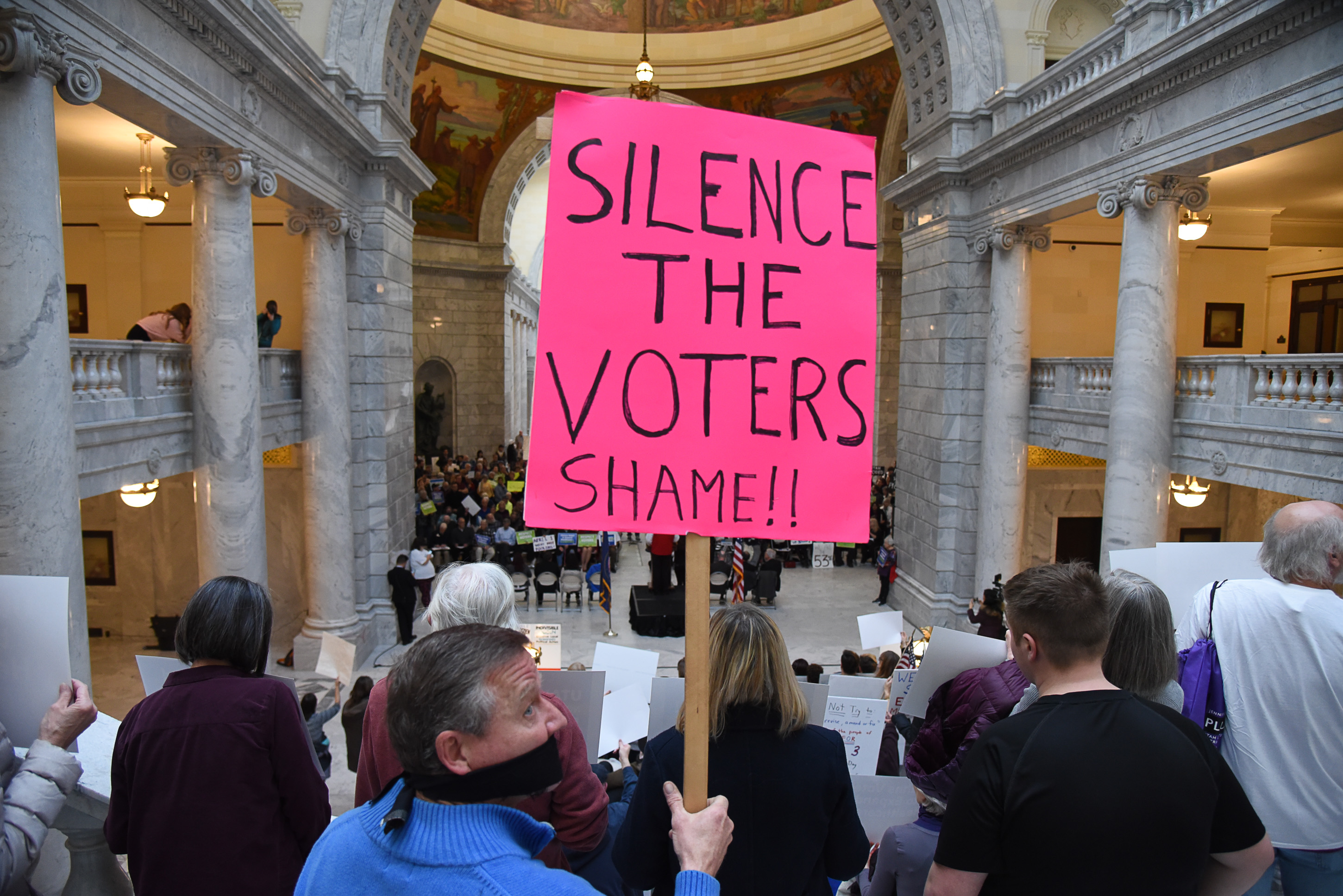 (Francisco Kjolseth | The Salt Lake Tribune) Eric Wilson expresses his sentiments as he joins over 300 demonstrators in the Capitol rotunda on Monday, Jan, 28, 2019, on the first day of the Legislative session to rally in support of protecting Proposition 3, the Medicaid Expansion law recently passed by voters.