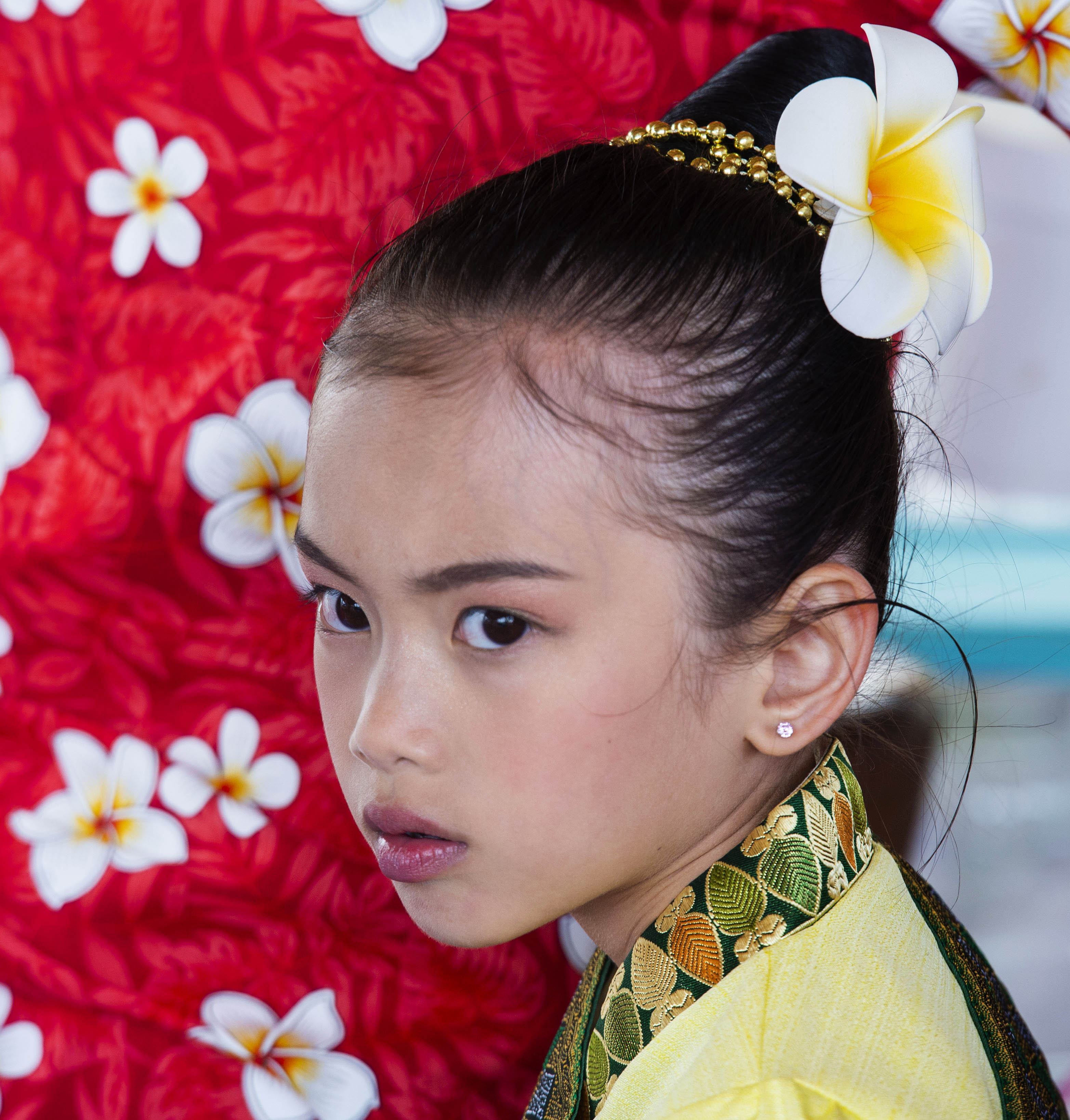 (Rick Egan | The Salt Lake Tribune) Kandra Konboukay, 7 stands by her mother as she makes a papaya salad, during the Wat Lao Salt Lake Buddharam Utah, New Year Celebration, in West Valley City, Sunday, April 28, 2019. 