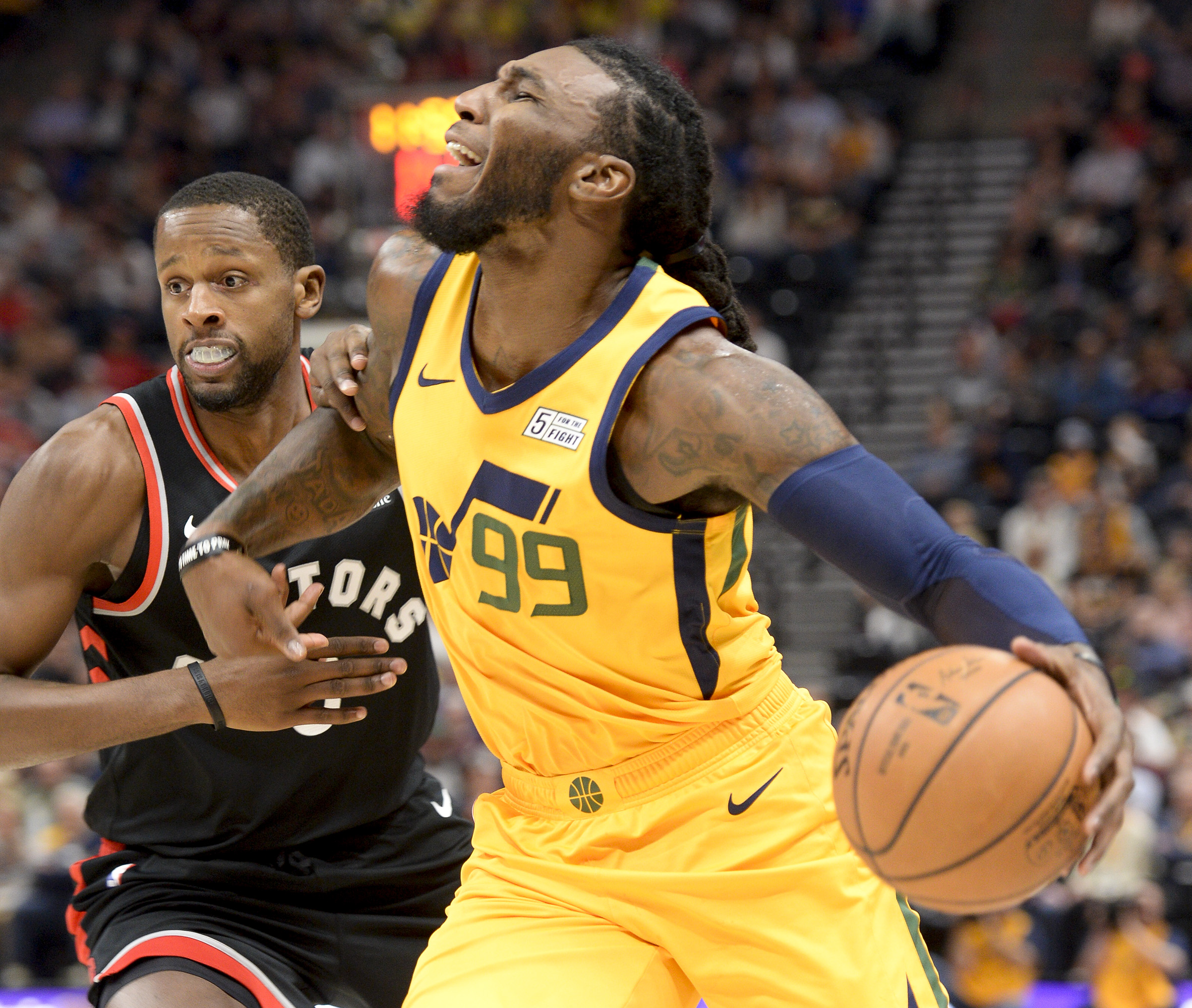 Leah Hogsten | The Salt Lake Tribune Toronto Raptors forward CJ Miles (0) fouls Utah Jazz forward Jae Crowder (99) as the Utah Jazz host the Toronto Raptors, Monday, Nov. 5, 2018 at Vivant Smart Home Arena.