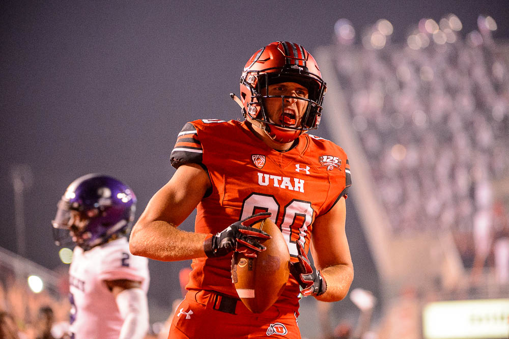 (Trent Nelson | The Salt Lake Tribune) Utah Utes tight end Brant Kuithe (80) scores a touchdown as the University of Utah Utes host the Weber State Wildcats, Thursday Aug. 30, 2018 at Rice-Eccles Stadium in Salt Lake City.