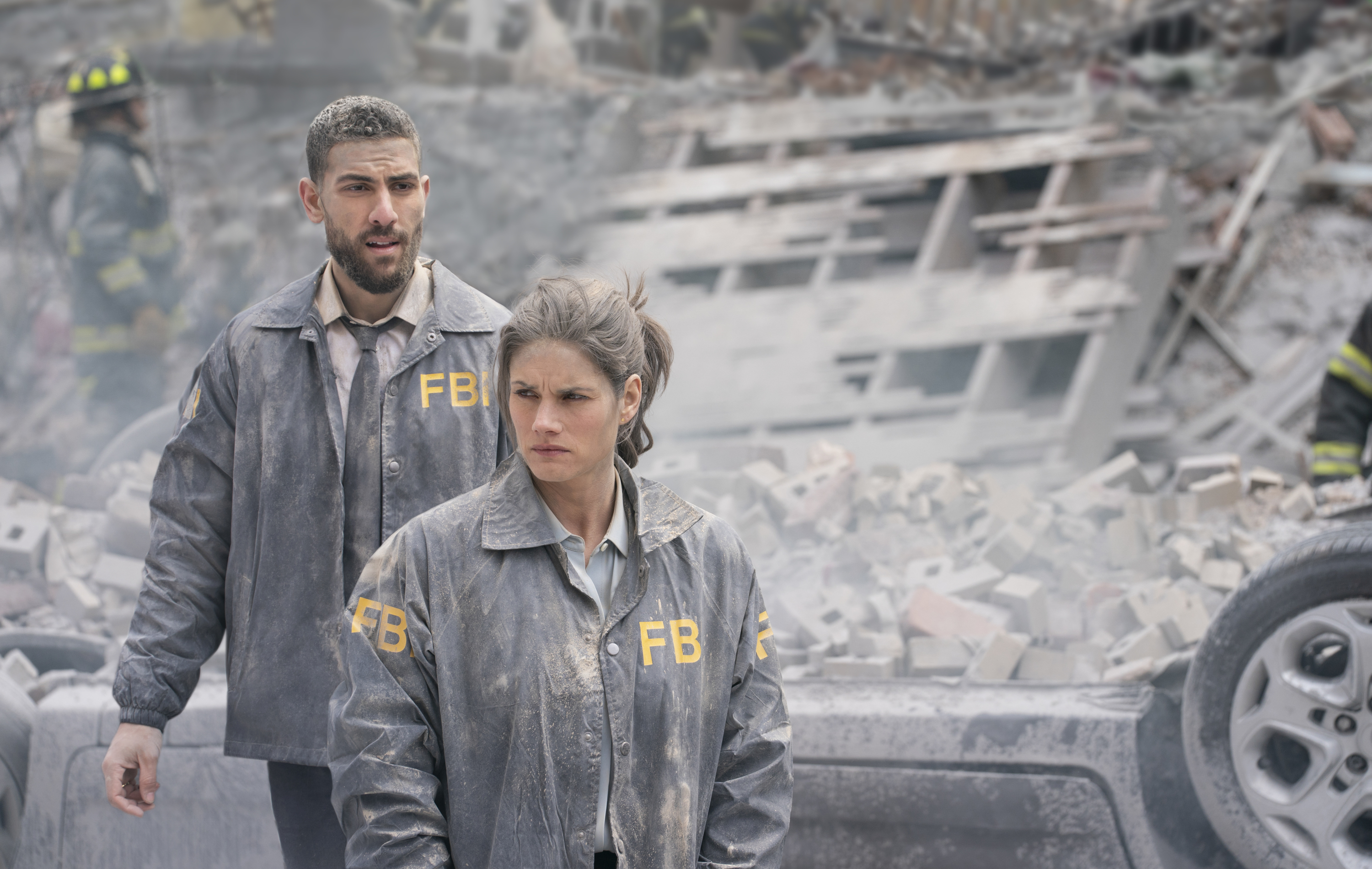 (Photo courtesy Michael Parmelee/CBS) Special Agent Maggie Bell (Missy Peregrym) and her partner, Special Agent Omar Adom 'OA' Zidan (Zeeko Zaki) after a bomb brought down a building on “FBI.”