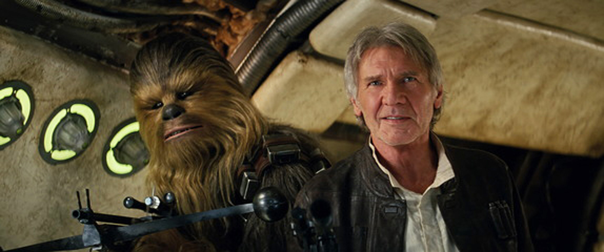 This photo provided by Lucasfilm shows Peter Mayhew as Chewbacca and Harrison Ford as Han Solo in "Star Wars: The Force Awakens." The movie opens in U.S. theaters on Dec. 18, 2015. (Film Frame/Lucasfilm via AP) -