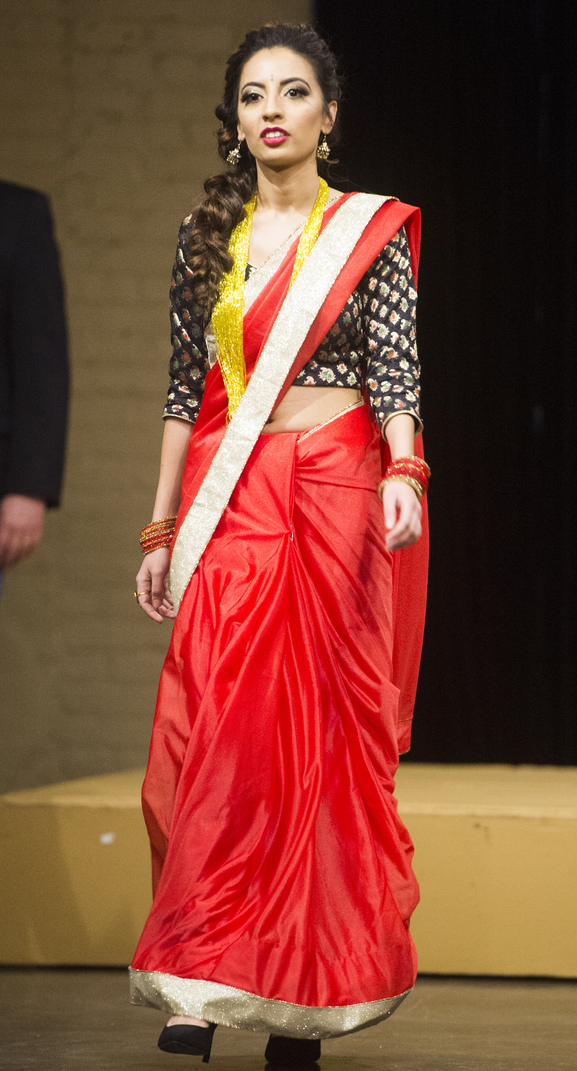 (Rick Egan | The Salt Lake Tribune) Aarati Ghimire from Nepal, walks the runway at the 8th Annual Women of the World Fashion Show. The fashion show fund is raiser for the non-profit that seeks to help refugees settle in a new culture. Wednesday, March 7, 2018. 