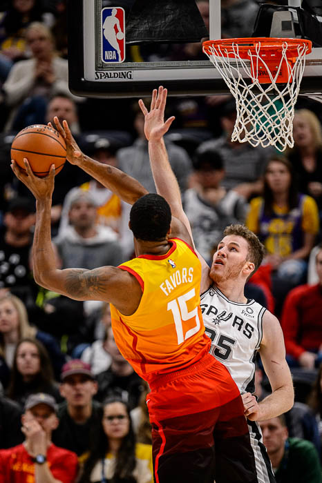 (Trent Nelson | The Salt Lake Tribune) Utah Jazz forward Derrick Favors (15) shoots over San Antonio Spurs center Jakob Poeltl (25) as the Utah Jazz host the San Antonio Spurs, NBA basketball in Salt Lake City on Saturday Feb. 9, 2019.