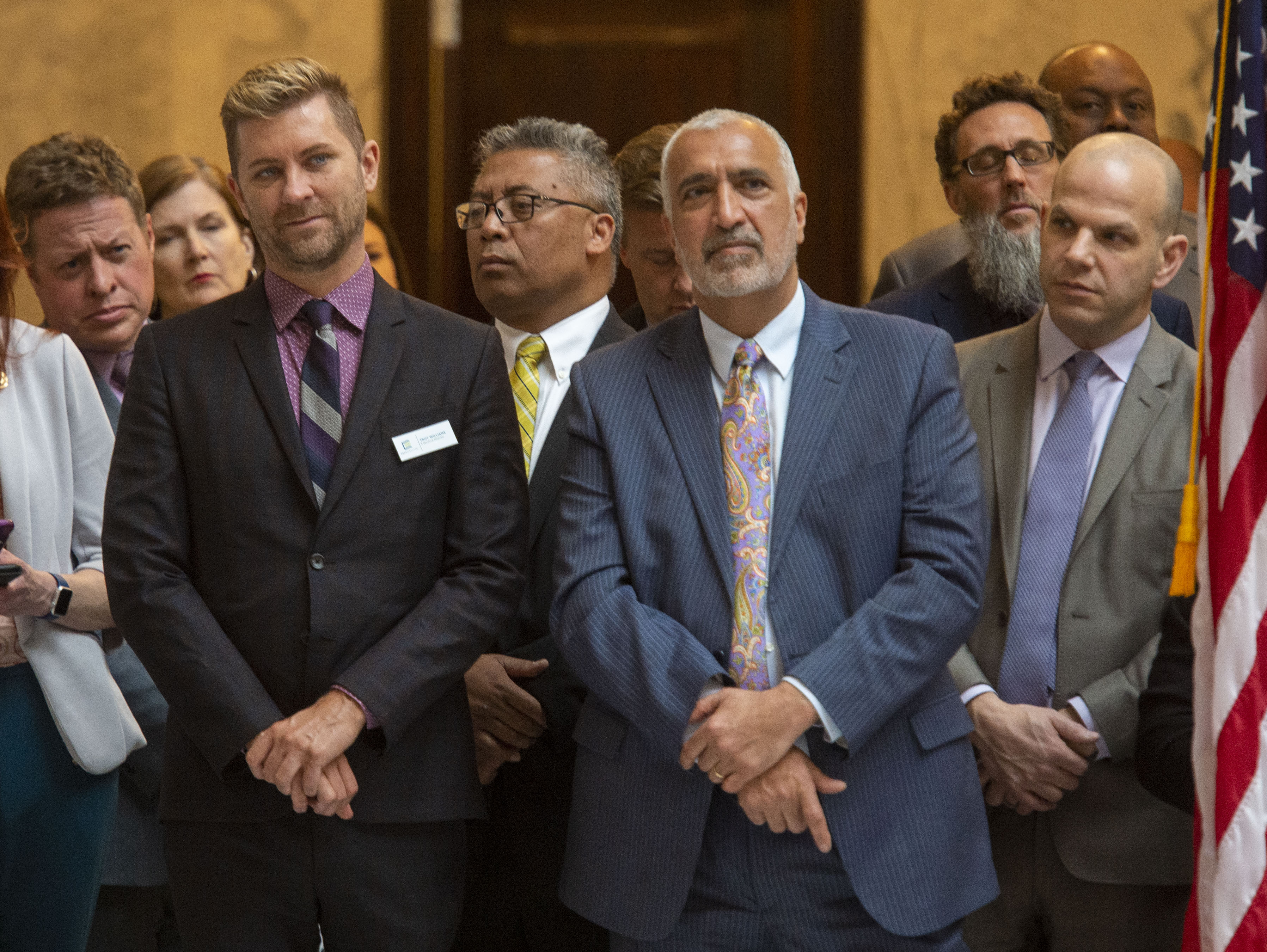 (Rick Egan | The Salt Lake Tribune) Troy Williams and Sim Gill, listen to the speakers before Gov. Gary R. Herbert signed the new hate crimes bill, at the Utah State Capitol, Tuesday, April 2, 2019. 