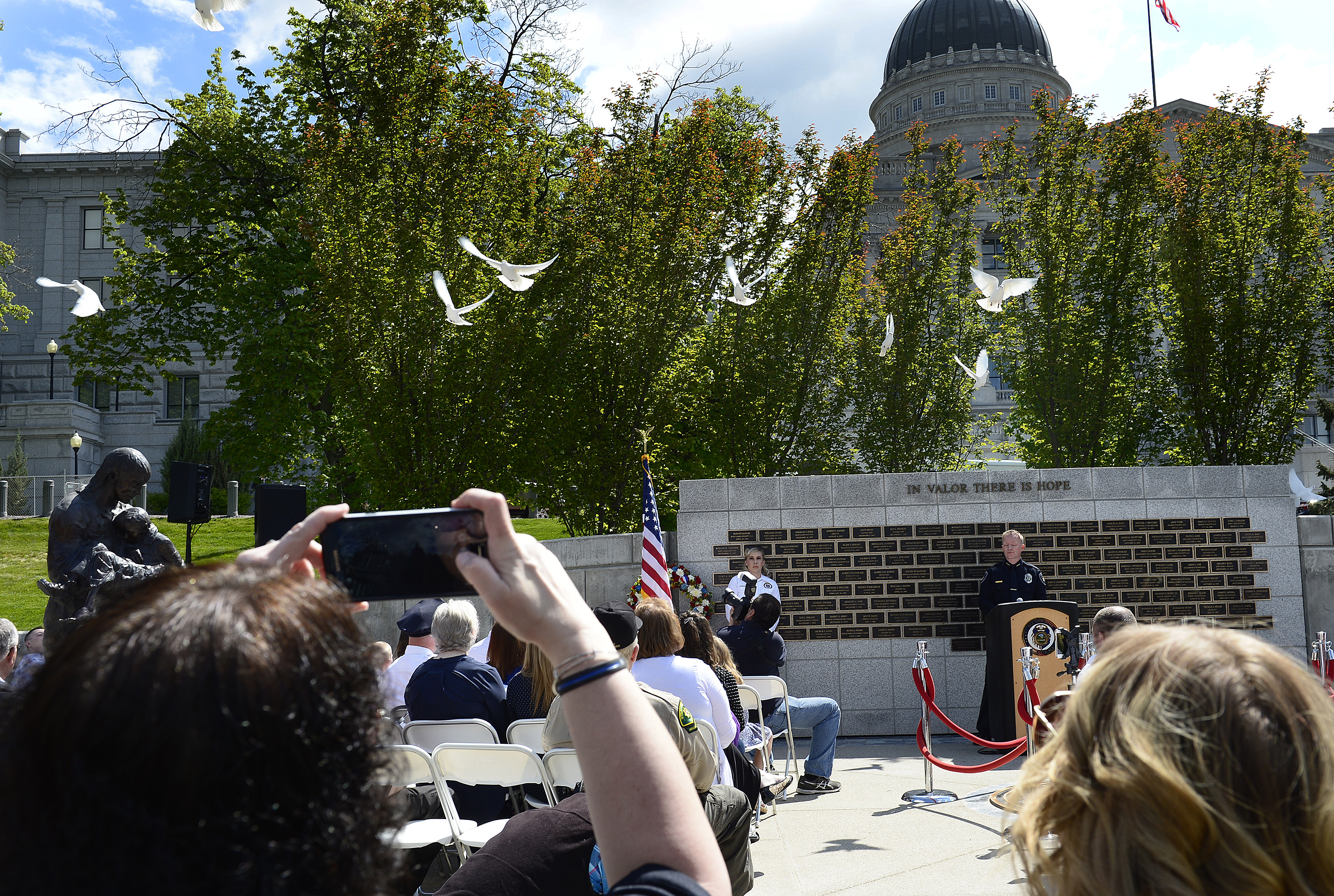 (Scott Sommerdorf | The Salt Lake Tribune) Doves are released at the Utah Law Enforcement Memorial to honor the 142 police officers killed in the line of duty to the state of Utah, Thursday, May 3, 2018. No Utah law enforcement officer died in the line of duty last year.