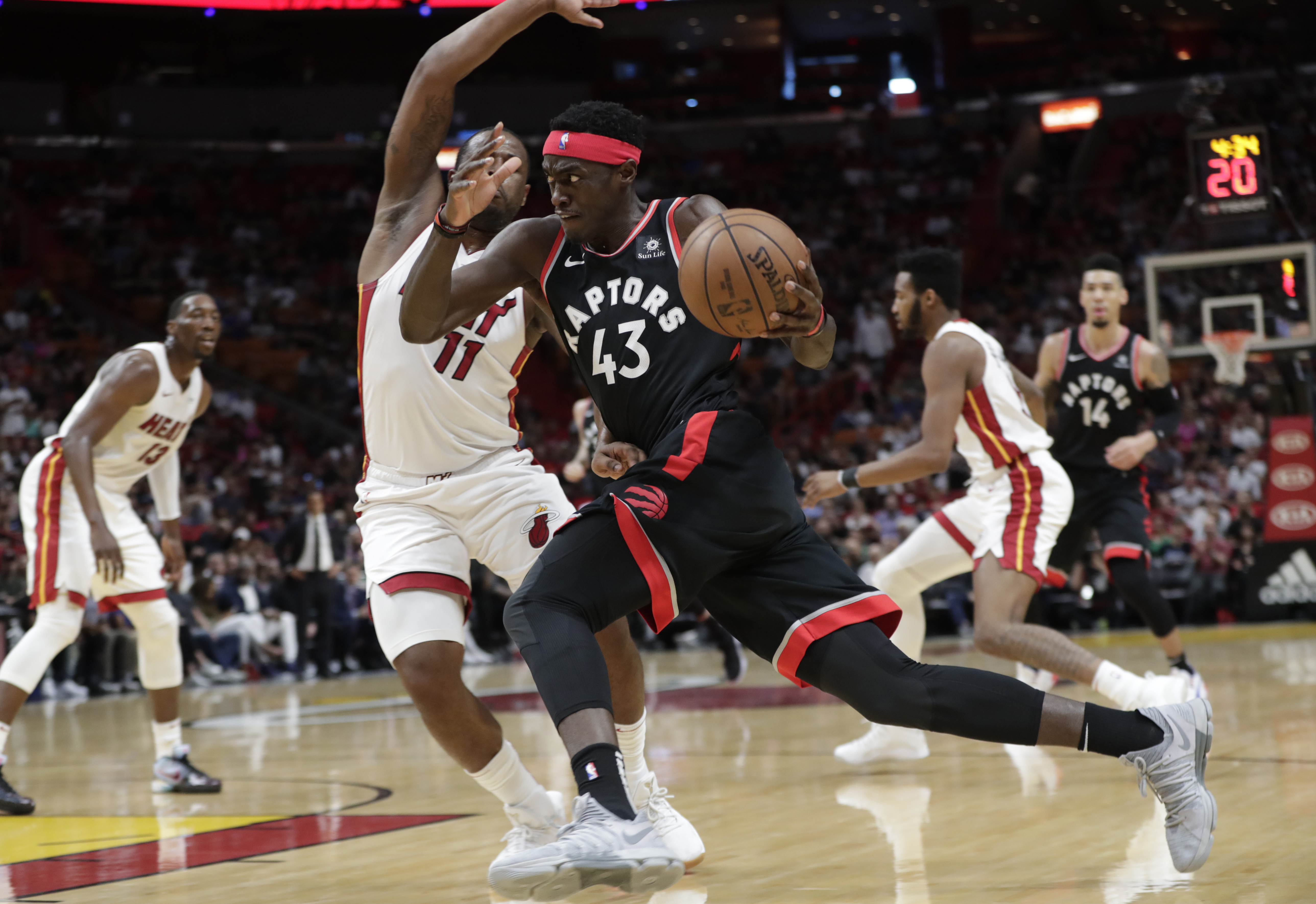 Toronto Raptors forward Pascal Siakam (43) drives to the basket as Miami Heat guard Dion Waiters (11) defends during the first half of an NBA basketball game, Sunday, March 10, 2019, in Miami. (AP Photo/Lynne Sladky)