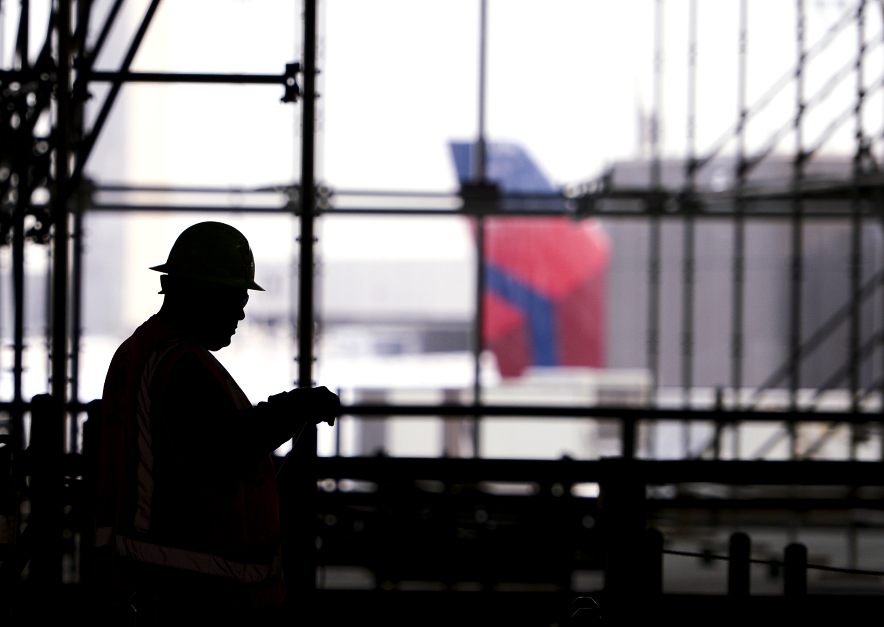 Leah Hogsten | The Salt Lake Tribune Salt Lake City International Airport's first phase construction of the $3.6 billion project is hitting the halfway mark — and large new buildings and elevated roadways are more easily seen. Nearing completion is the new concourse for aircraft gates, an enclosed new terminal, the steel skeleton of a new “gateway” building, a new five-story parking garage and elevated roadways. 