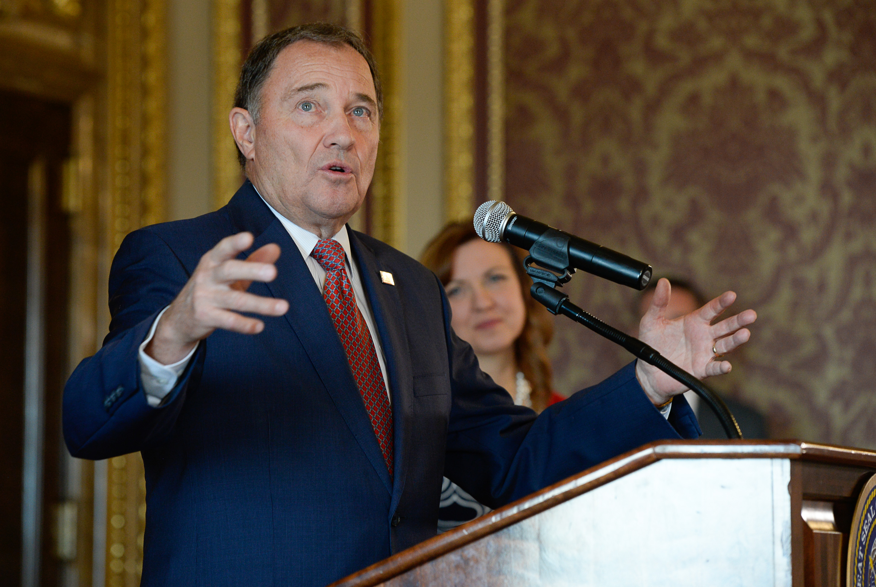 (Francisco Kjolseth | The Salt Lake Tribune) Governor Gary Herbert makes his plea "consider becoming a teacher, it's a noble profession," as he is joined by Aaryn Birchell, 2017-2018 Utah Teacher of the Year, in background, and other education leaders at the Utah Capitol to discuss UtahÕs teacher shortage during a press event on Wed. Sept. 12, 2018. 
