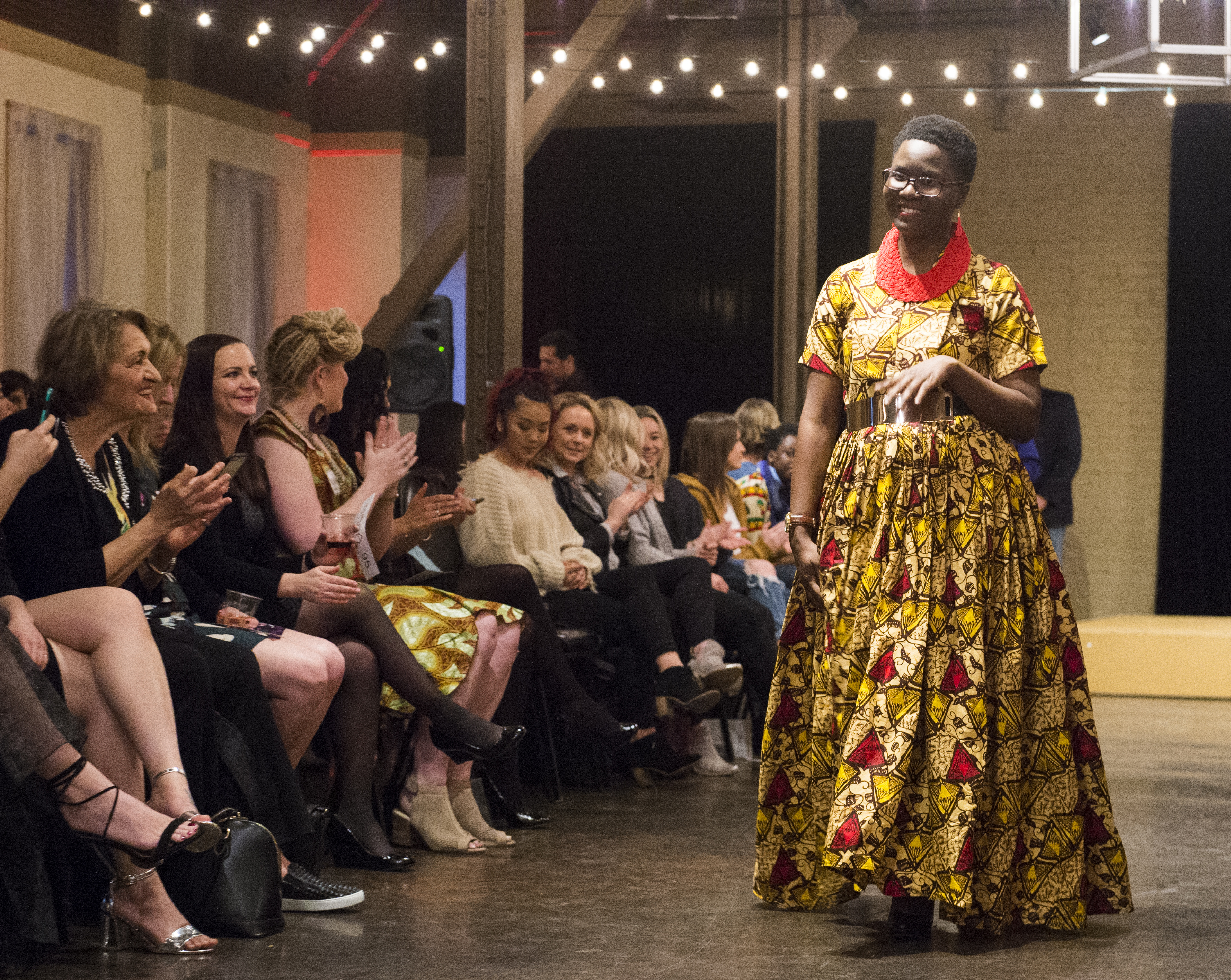 (Rick Egan | The Salt Lake Tribune) Lillian Thando from Uganda, walks the runway at the 8th Annual Women of the World Fashion Show. The fashion show fund is raiser for the non-profit that seeks to help refugees settle in a new culture. Wednesday, March 7, 2018. 