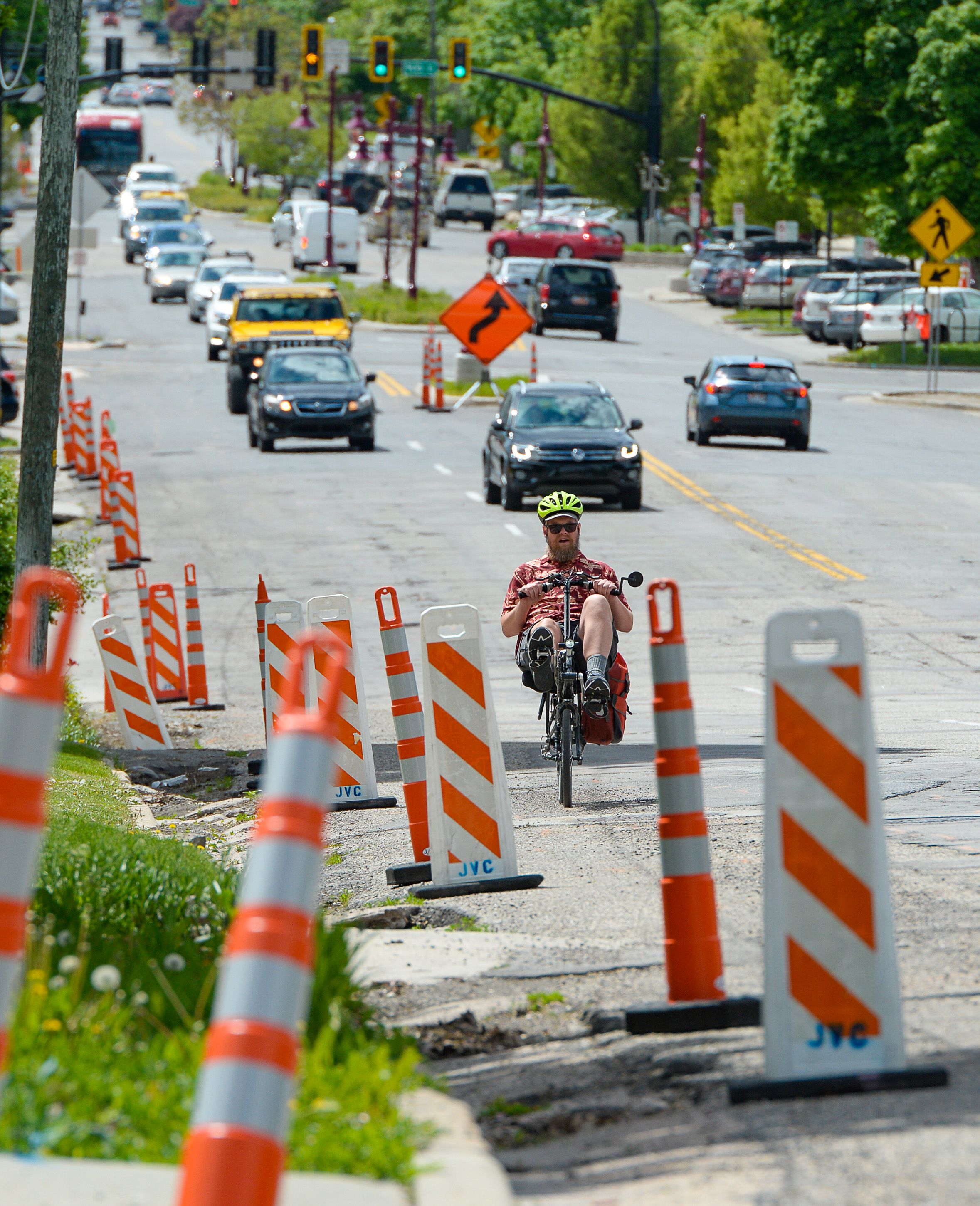 (Francisco Kjolseth | The Salt Lake Tribune) Traffic moves along a sea of orange as plans to repurpose 29 parking spaces between 950 East and 1300 East on 900 South in Salt Lake City causes some frustration from business owners and residents in the area.
